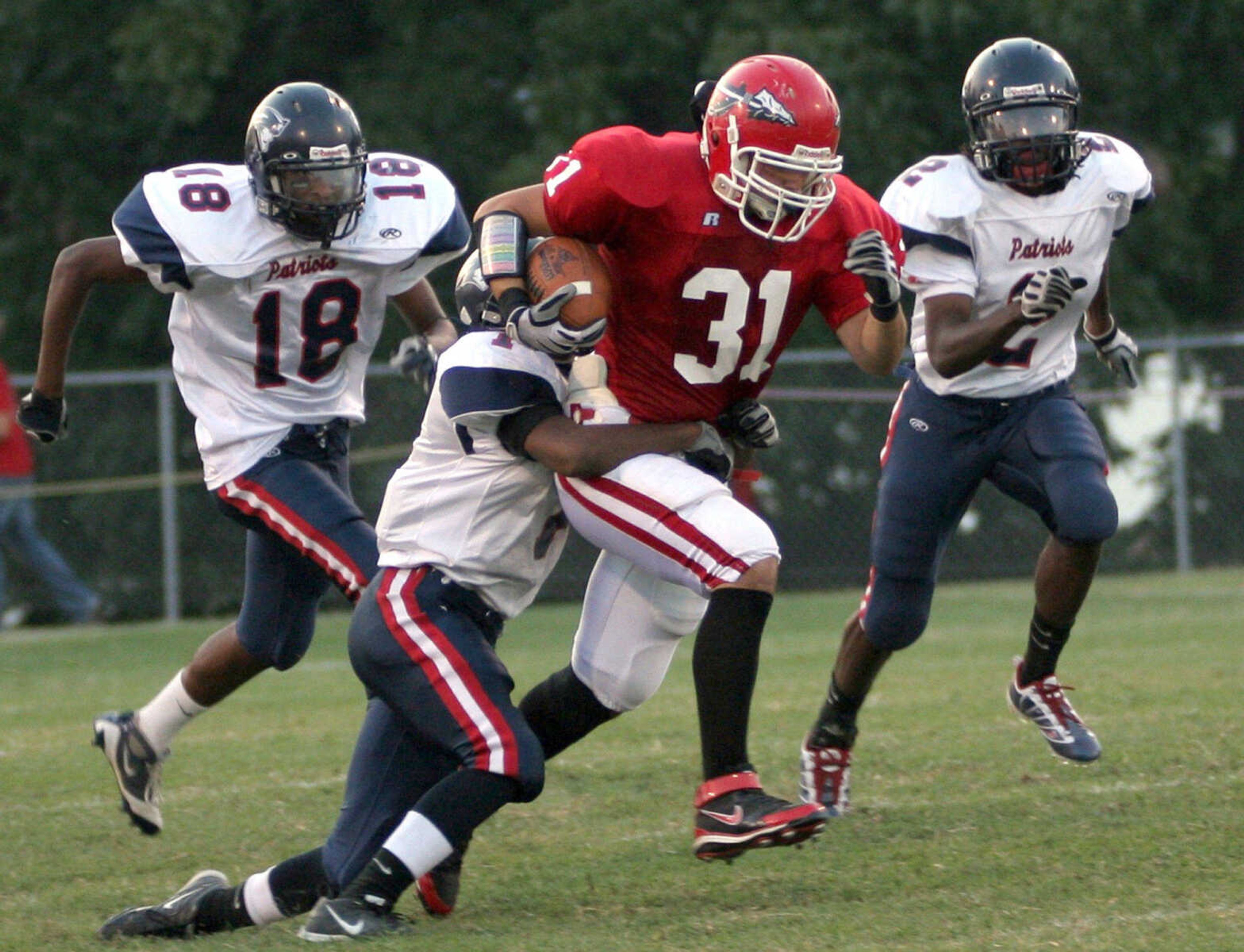 SEAN MAGEE ~ photos@semissourian.com
Jackson's Cole Rodgers drags Parkway South's Alphonso Scott five yards before being tackled Friday at Jackson.