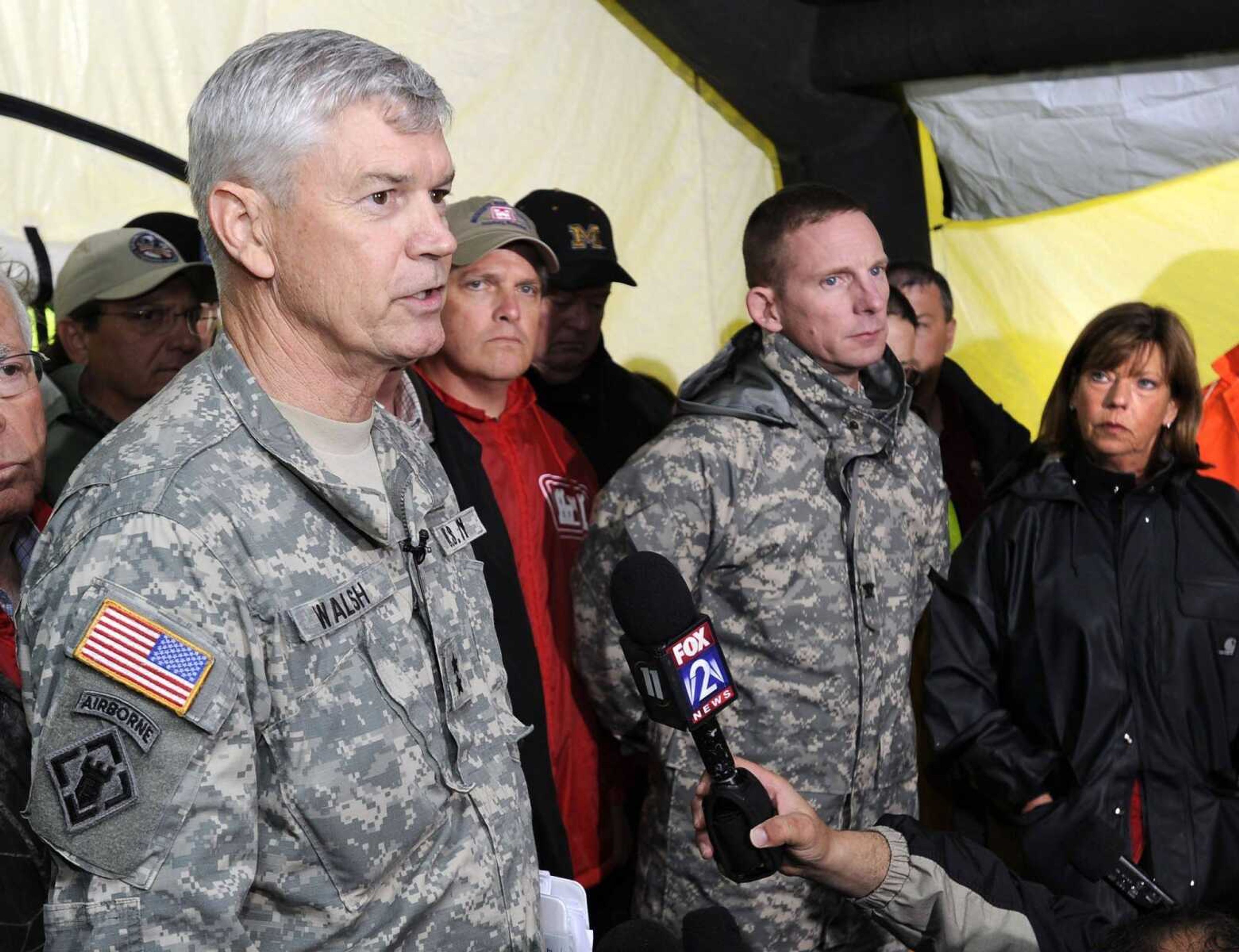 Maj. Gen. Michael Walsh announces at a news conference Monday, May 2, 2011 that the U.S. Army Corps of Engineers will activate the Birds Point-New Madrid Floodway starting at 9 p.m. Col. Vernie Reichling Jr., center, also spoke. At right is U.S. Rep. Jo Ann Emerson. (Fred Lynch)