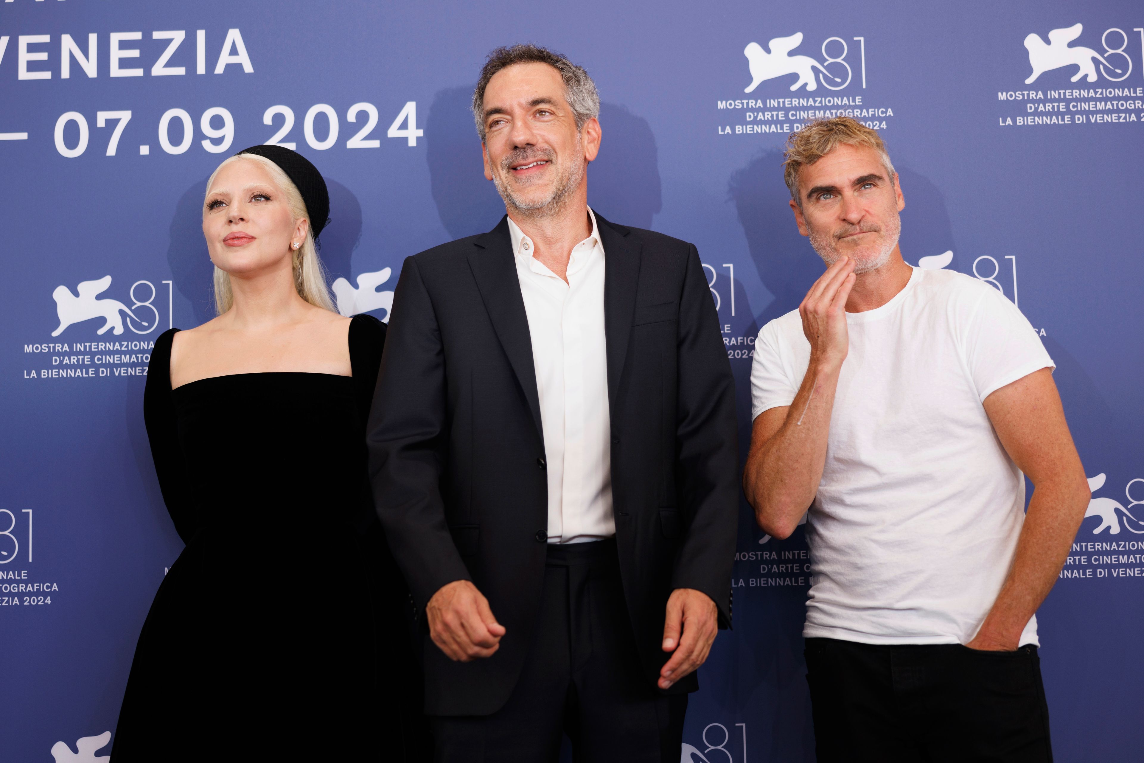 FILE - Lady Gaga, from left, director Todd Phillips, and Joaquin Phoenix pose for photographers at the photo call for the film "Joker: Folie A Deux" during the 81st edition of the Venice Film Festival in Venice, Italy, on Sept. 4, 2024. (Photo by Vianney Le Caer/Invision/AP, File)