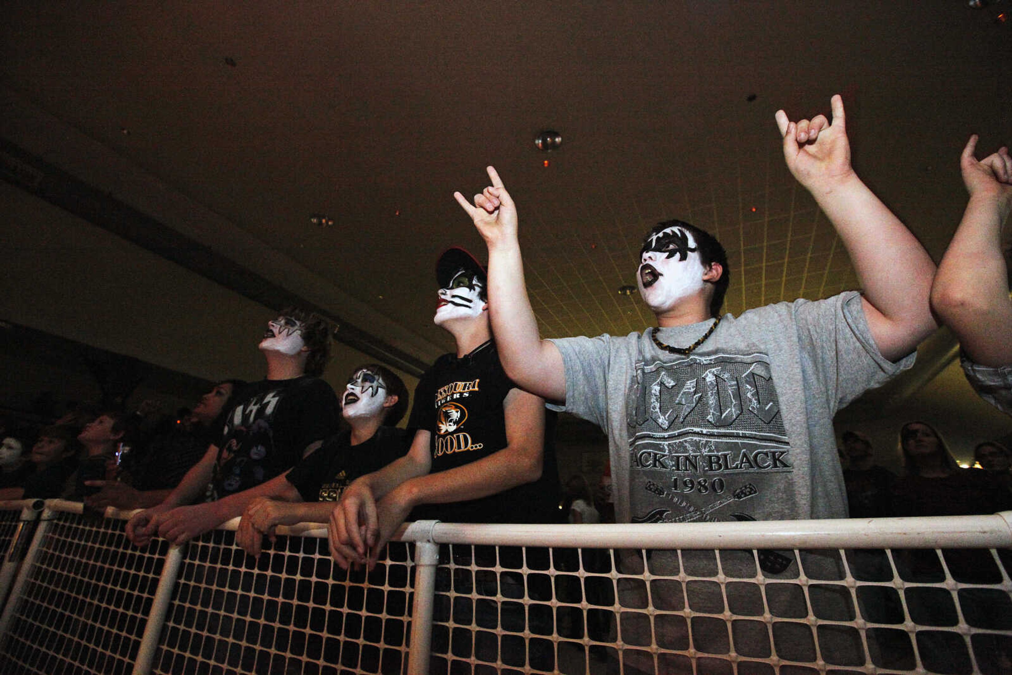 CHRIS MACKLER ~ photos@semissourian.com

Fans cheer as KISSiT performs during the Kiss, AC/DC and Rod Stewart Tribute Concert held at the Arena Building on Saturday, Nov. 6, 2010, in Cape Girardeau.