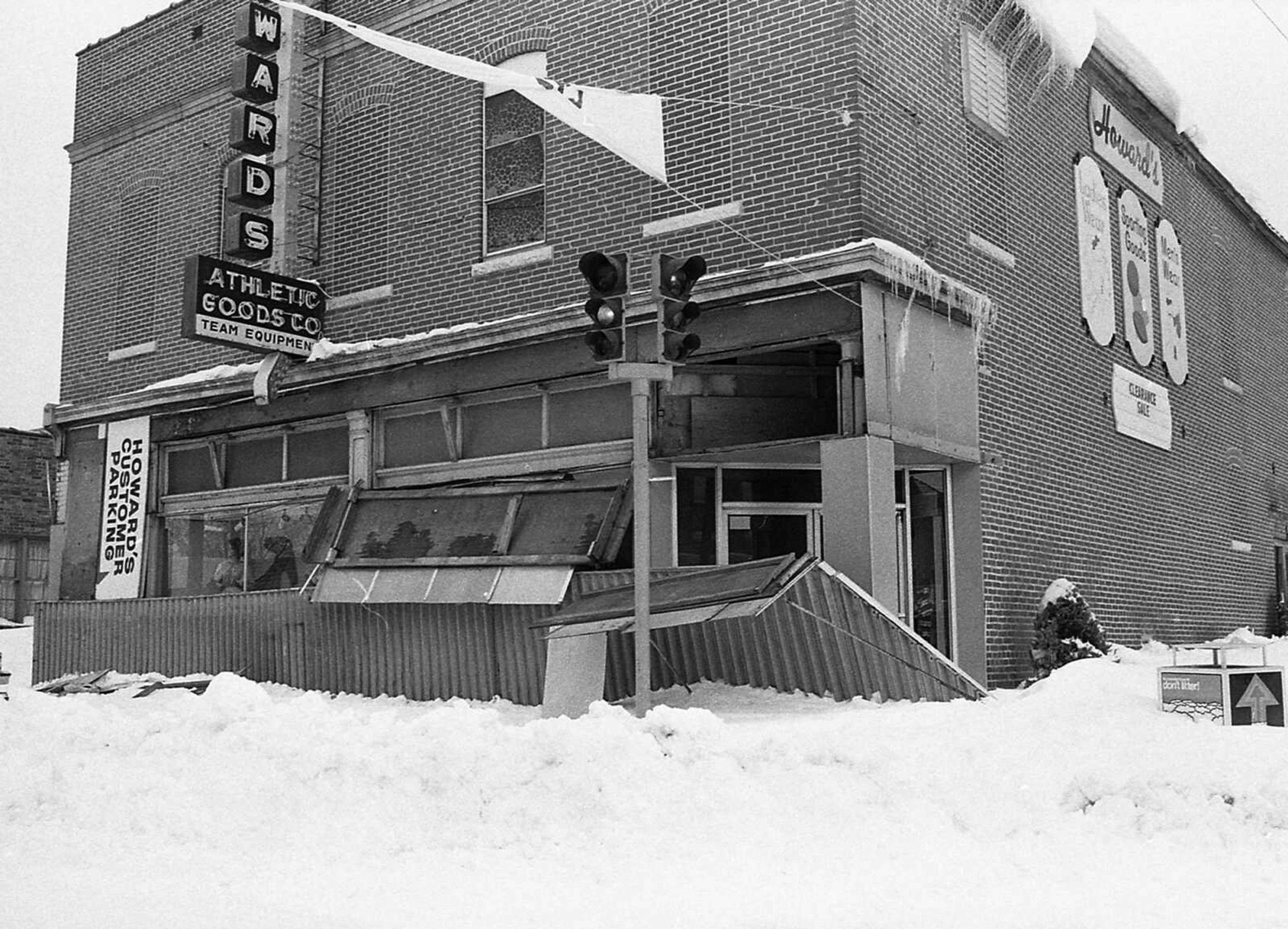 An awning collapsed under the weight of two feet of snow at the Howard's Athletic Goods store, Broadway and Pacific. (Southeast Missourian archive photo by Fred Lynch)