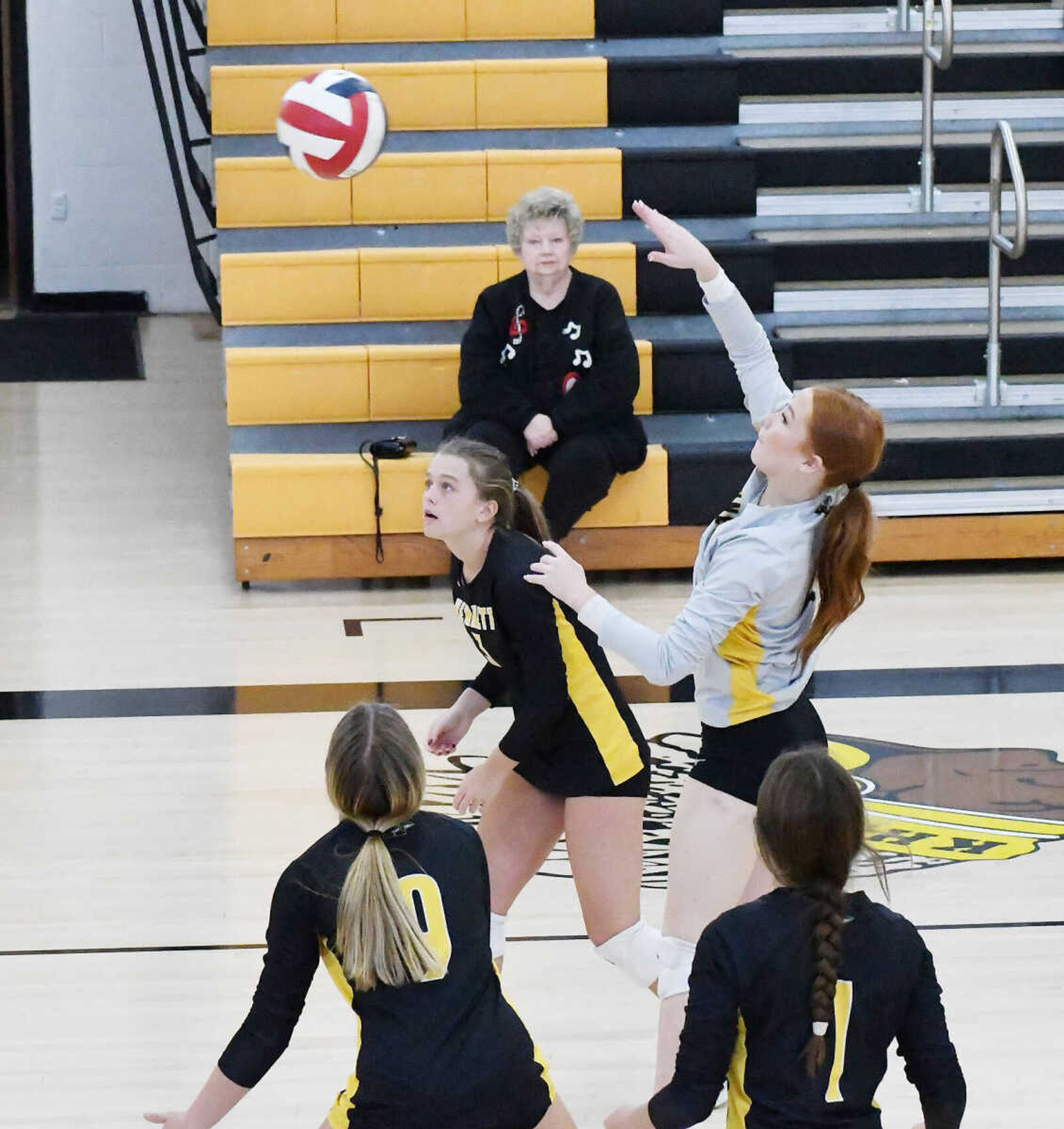 Kennett sophomore libero Baylee Wilcut (4) delivers on a back-row attack during a Monday, Oct. 9, match versus Saxony Lutheran.