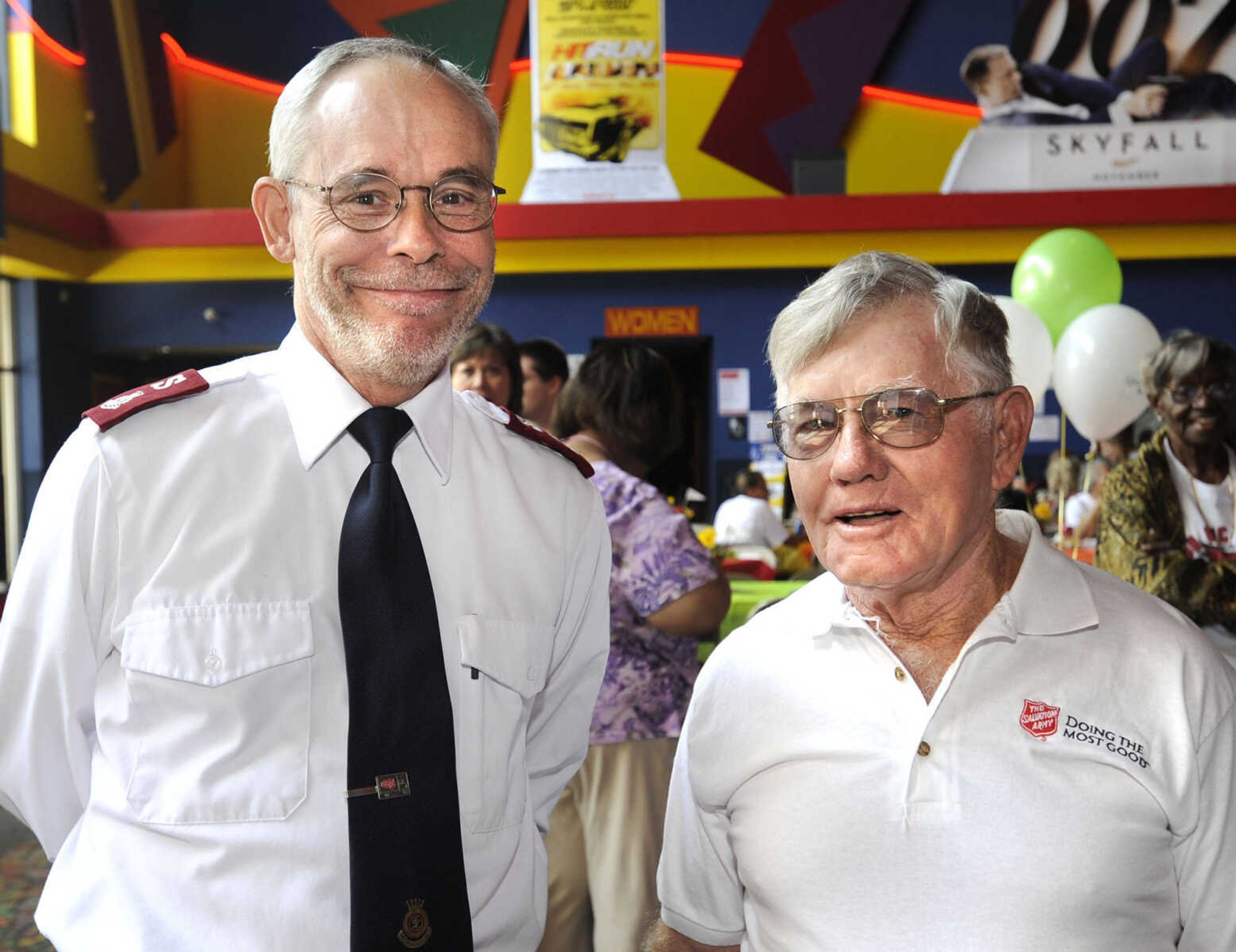 Maj. Ben Stillwell, left, and Ray Lamb pose at the United Way of Southeast Missouri campaign kickoff Aug. 30 at West Park 14 Cine.