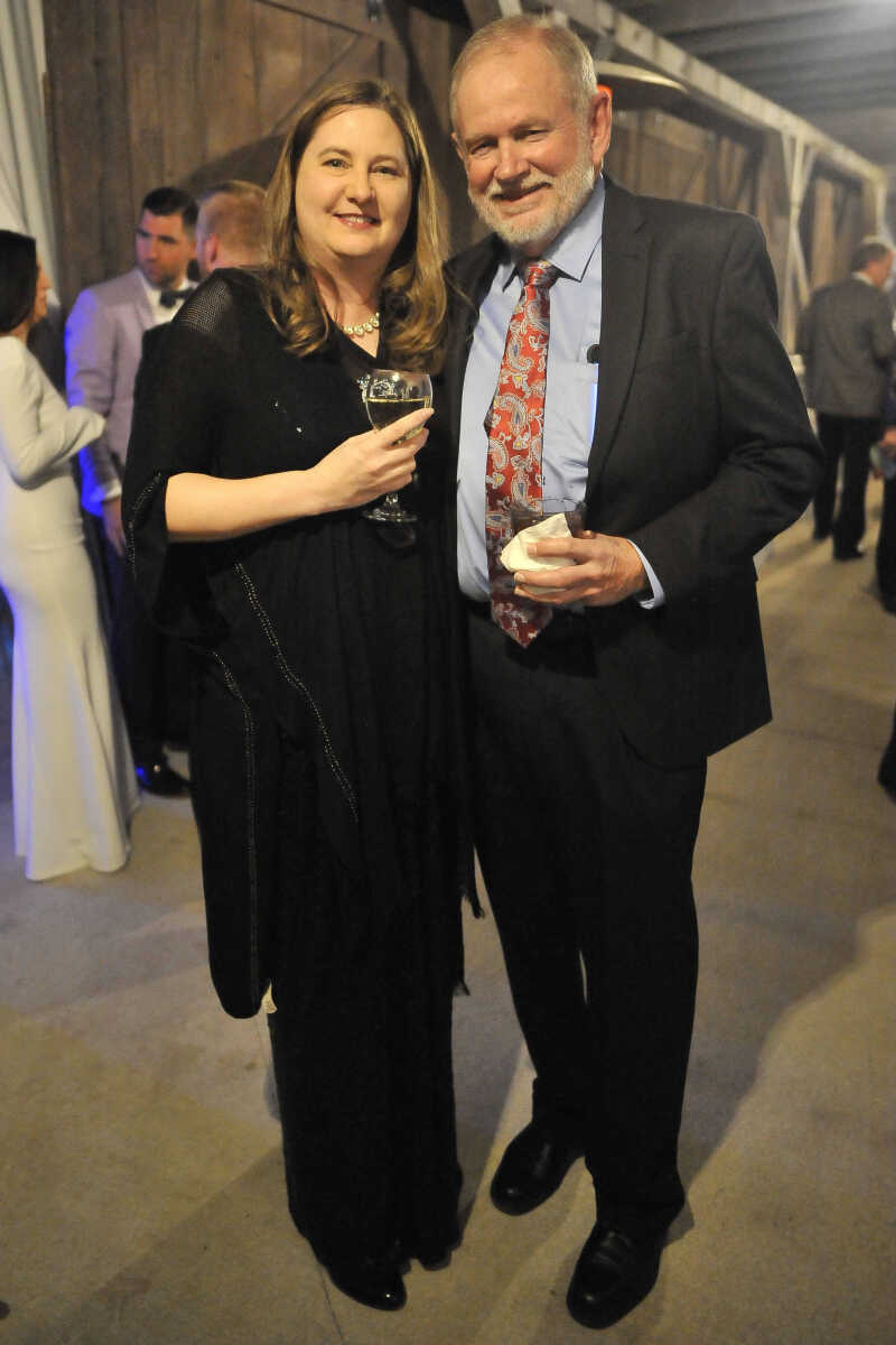 Vickie House and Mike Flautt pose for a photo during a fundraising gala for the American Cancer Society at Rusted Route Farms Saturday, Nov. 16, 2019, in Cape Girardeau.