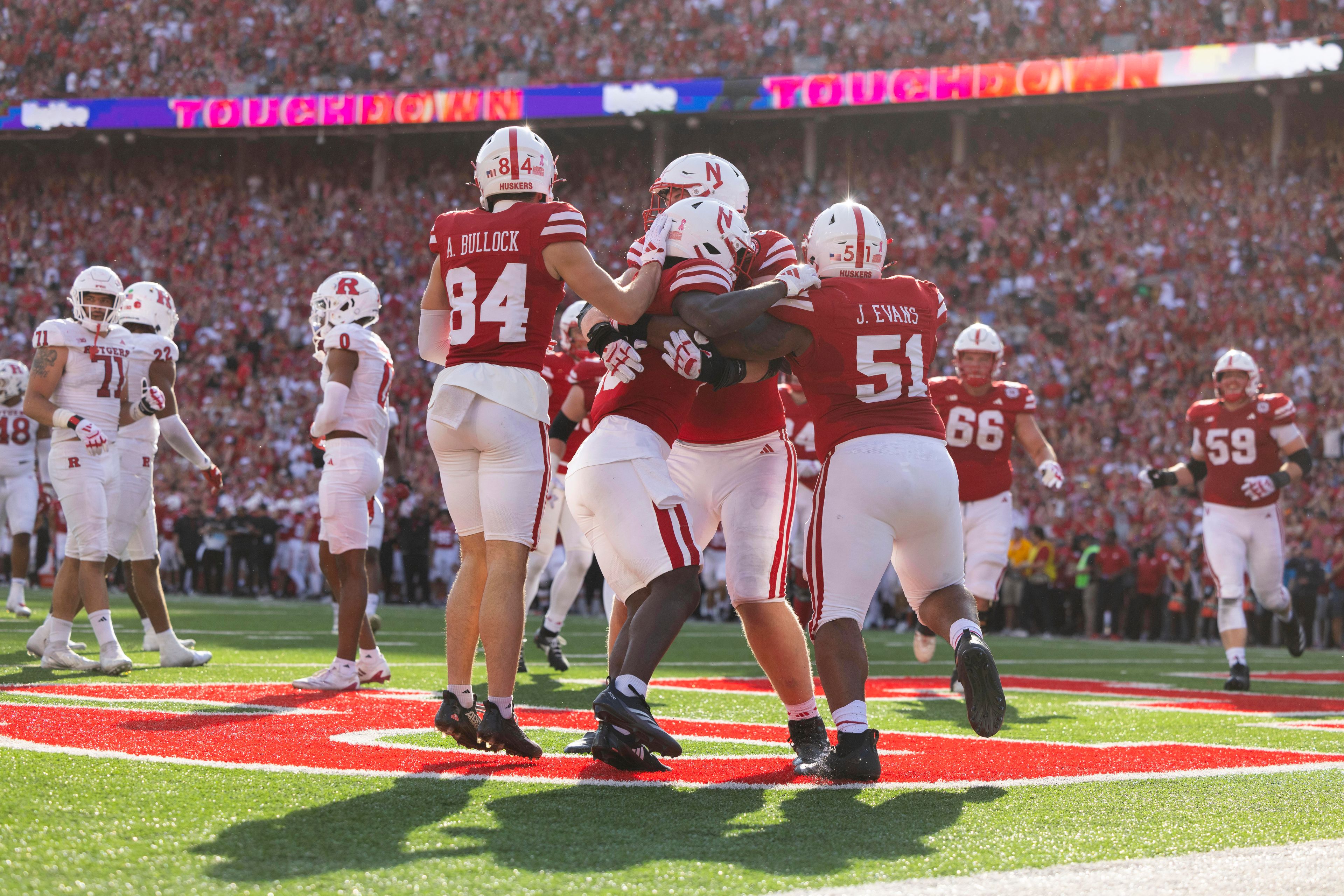 From left, Nebraska's Alex Bullock, Janiran Bonner, Bryce Benhart and Justin Evans Rutgers celebrate Bonner's touchdown against Rutgers during the first half of an NCAA college football game Saturday, Oct. 5, 2024, in Lincoln, Neb. (AP Photo/Rebecca S. Gratz)