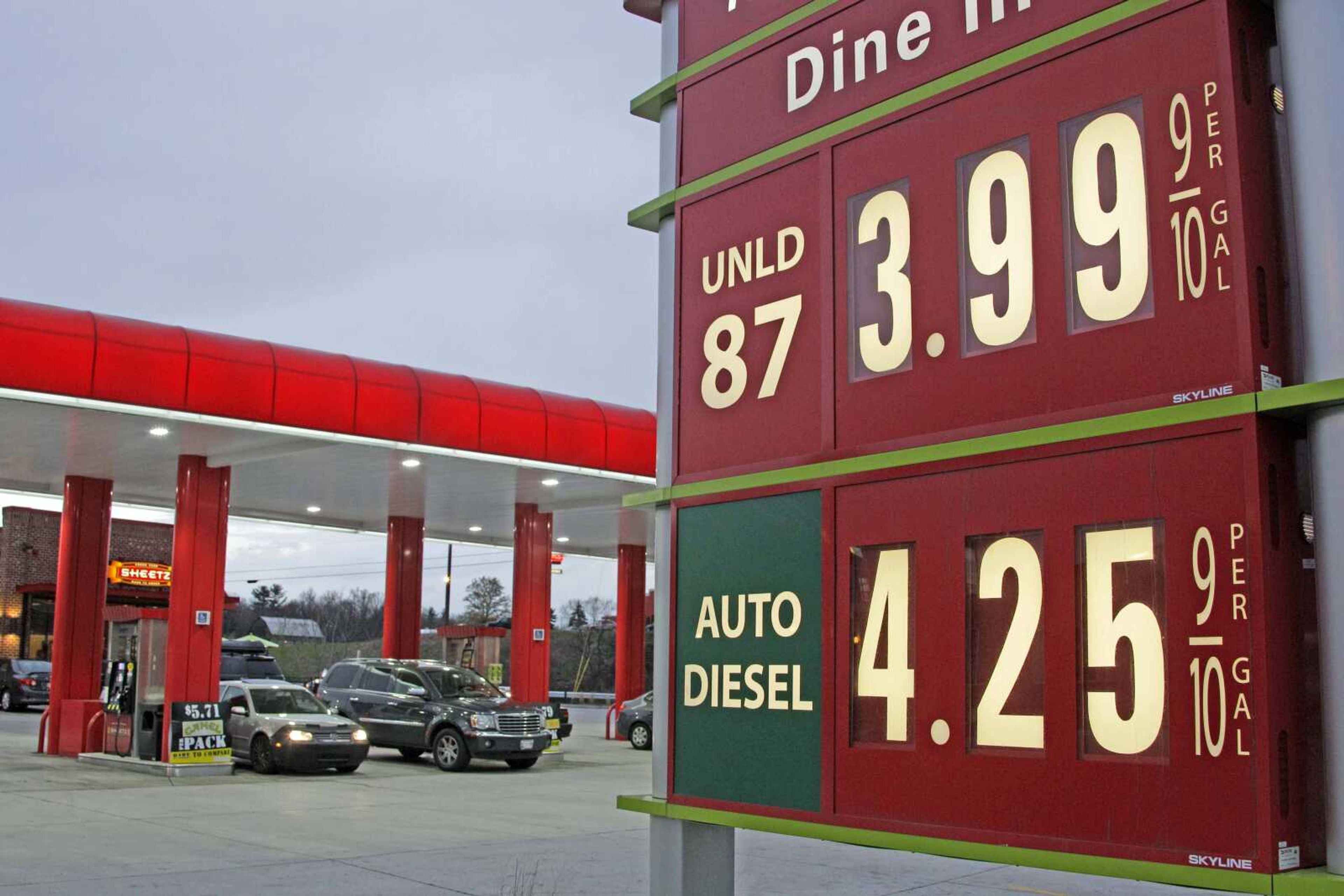 FILE - In this April 9, 2012 file photo, gas prices are posted at a gas station in Breezewood, Pa.  Pump prices rose relentlessly from January through April, pushing average gas prices above $3.90 a gallon and taxing families' budgets. Some forecasters expected a $5 peak by the time families got on the road for summer vacations. But prices are expected drop by 10 cents by next week, thanks to a recent drop in oil and wholesale gas prices and frugality at the pump.  (AP Photo/Gene J. Puskar)