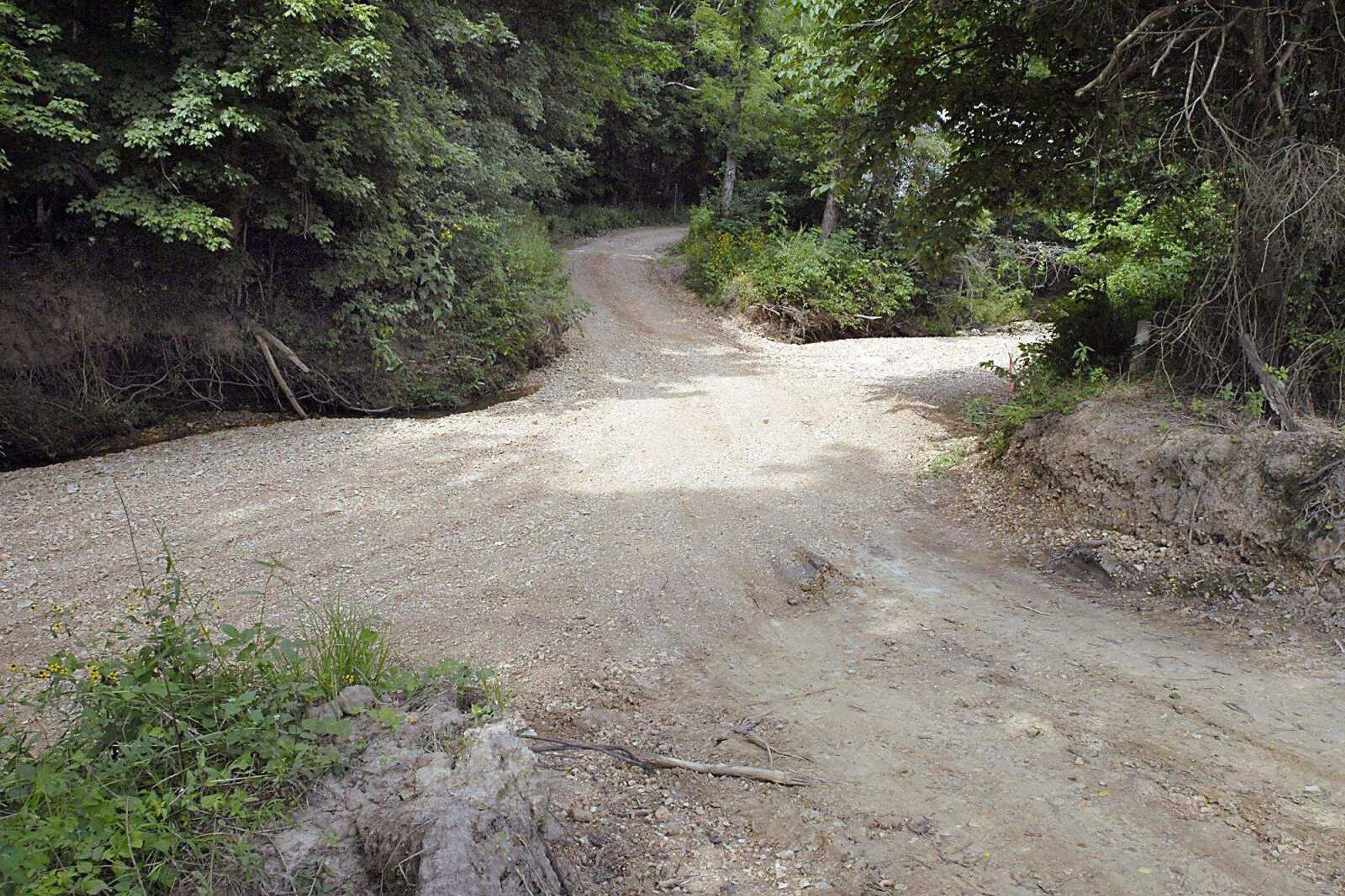 FRED LYNCH ~ flynch@semissourian.com
Looking to the north from the redirected stretch of County Road 532, with the old road, left, veering north and then east, with the creek bed, right.