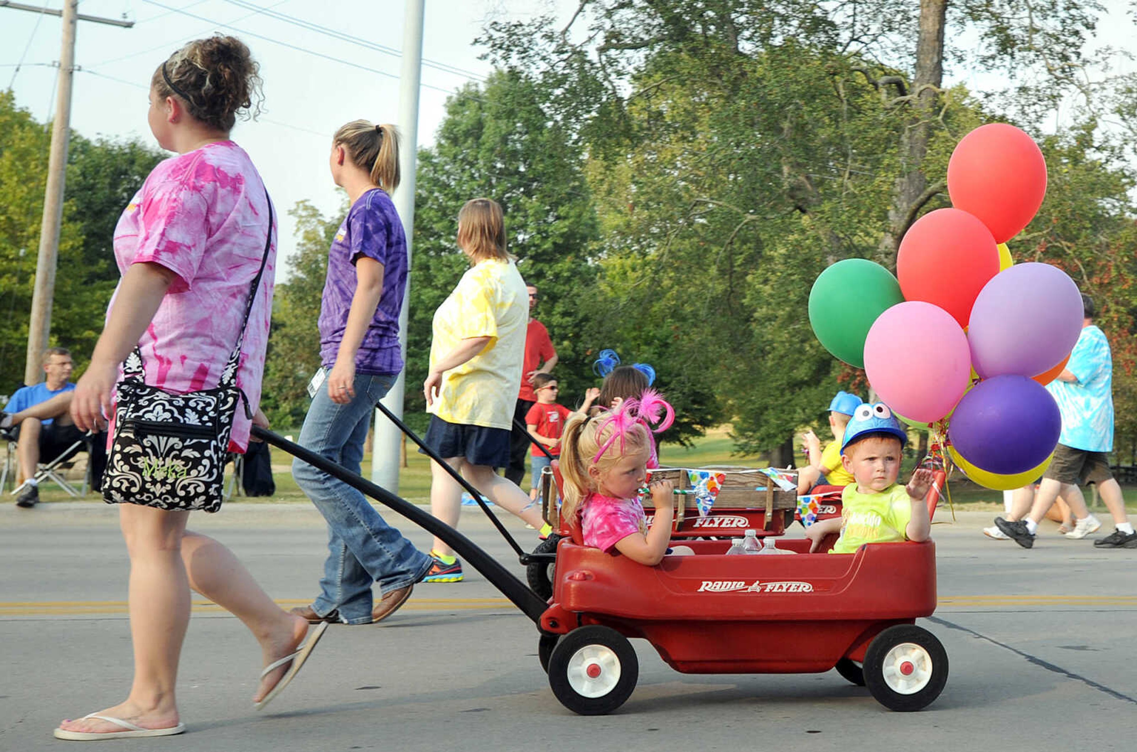 LAURA SIMON ~ lsimon@semissourian.com

The SEMO District Fair Parade moves along Broadway towards Arena Park, Monday, Sept. 9, 2013, in Cape Girardeau.