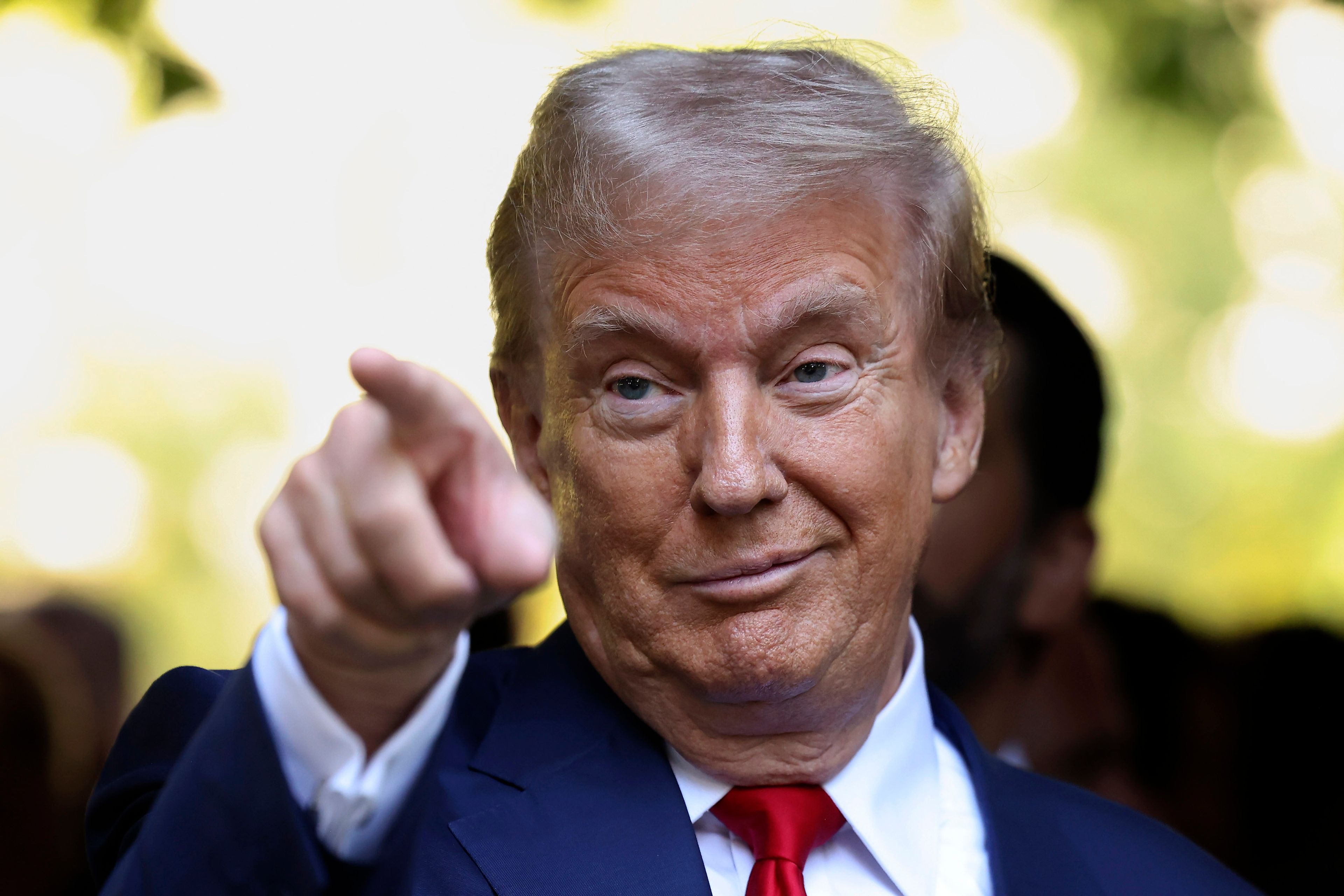 Republican presidential nominee former President Donald Trump motions while attending the 9/11 Memorial ceremony on the 23rd anniversary of the Sept. 11, 2001 terror attacks, Wednesday, Sept. 11, 2024, in New York. (AP Photo/Yuki Iwamura)