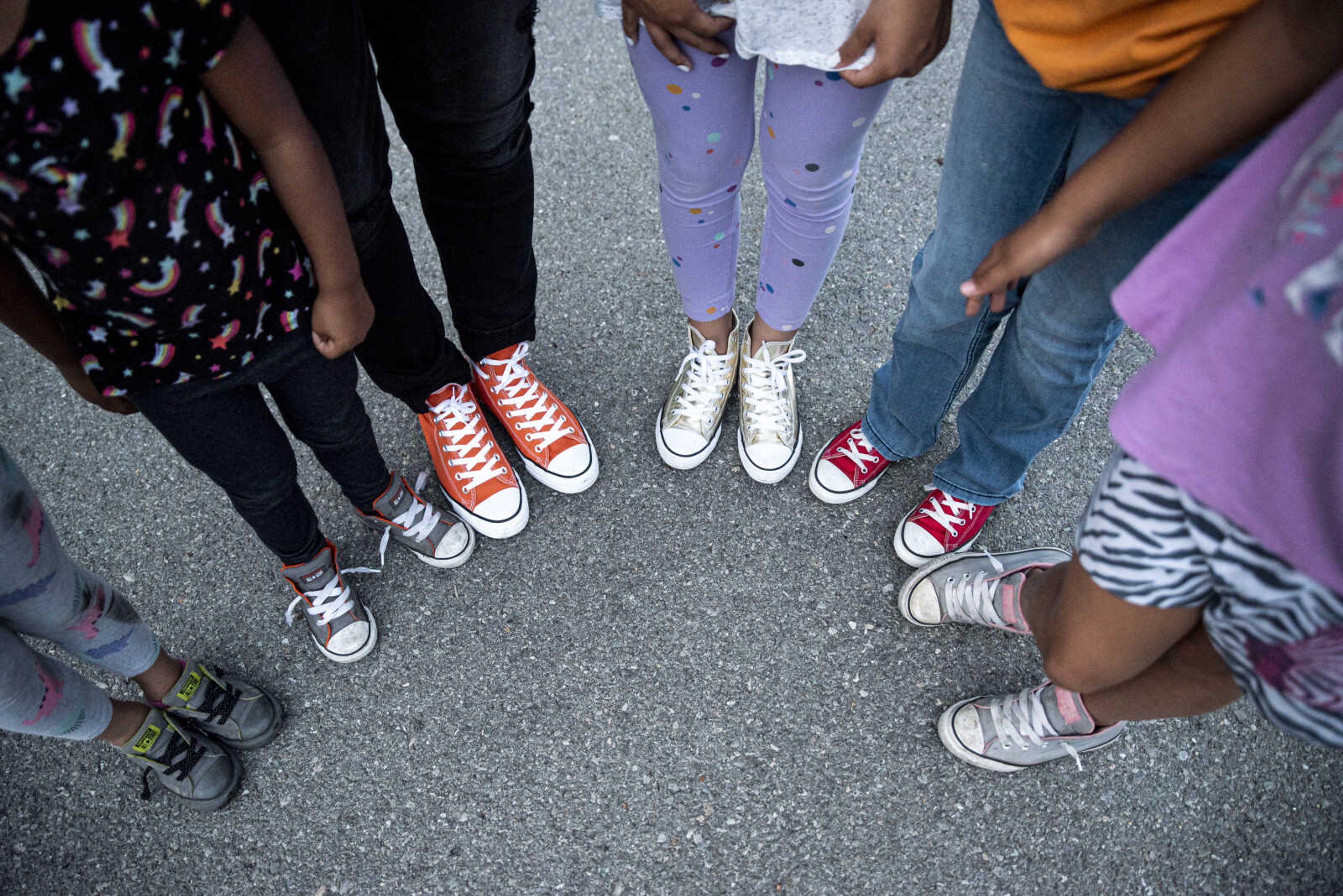 From left, the Becking family, Dolly, 5, Lennie, 4, Dr. Becking, Bianca, 12, Solie, 10, and Arianna, 7, pose for a photo Monday, June 3, 2019, in Cape Girardeau.