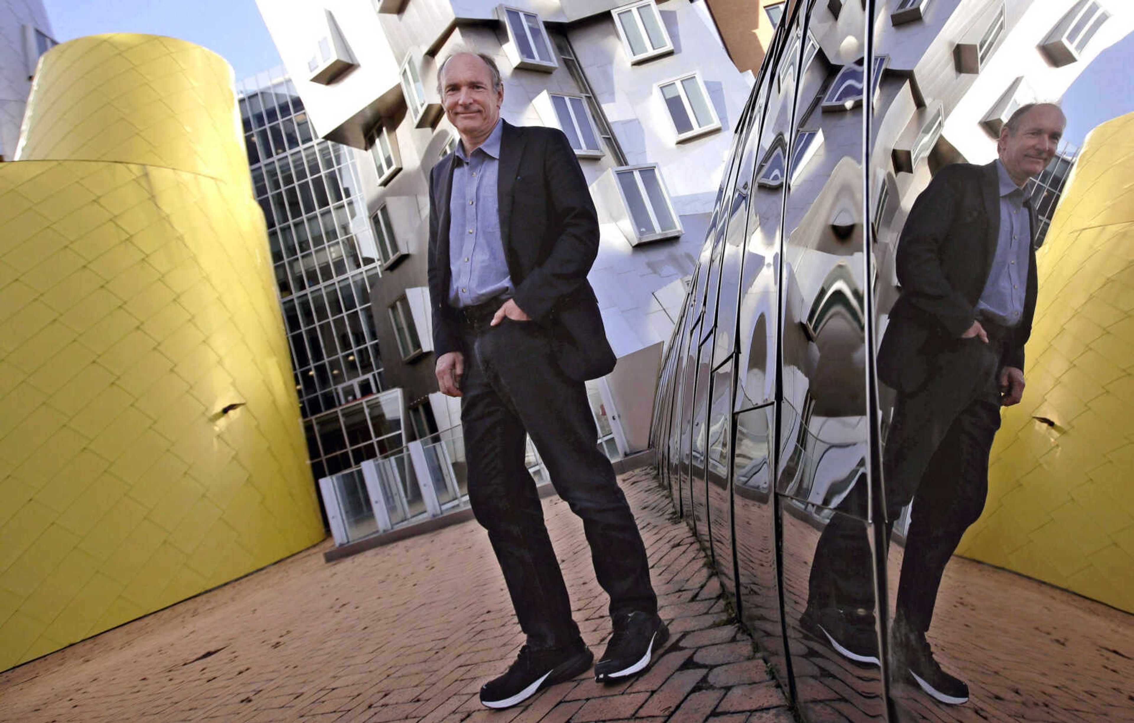 Tim Berners-Lee poses for a photo outside his office Monday at the Massachusetts Institute of Technology in Cambridge, Massachusetts.