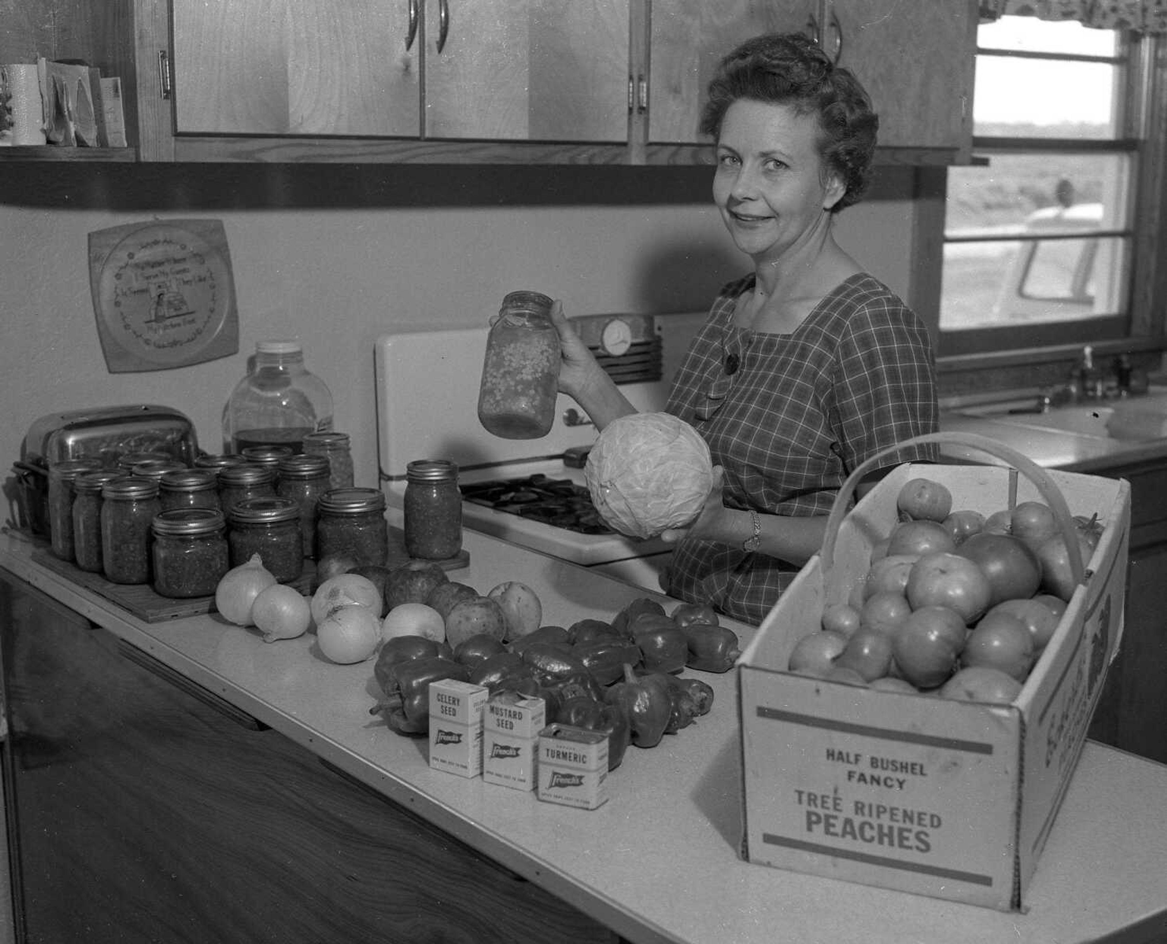 Canning the produce of a summer's garden was a good way to preserve the food for the coming winter, as this woman can attest. If you can provide information about this image, contact librarian Sharon Sanders at ssanders@semissourian.com.