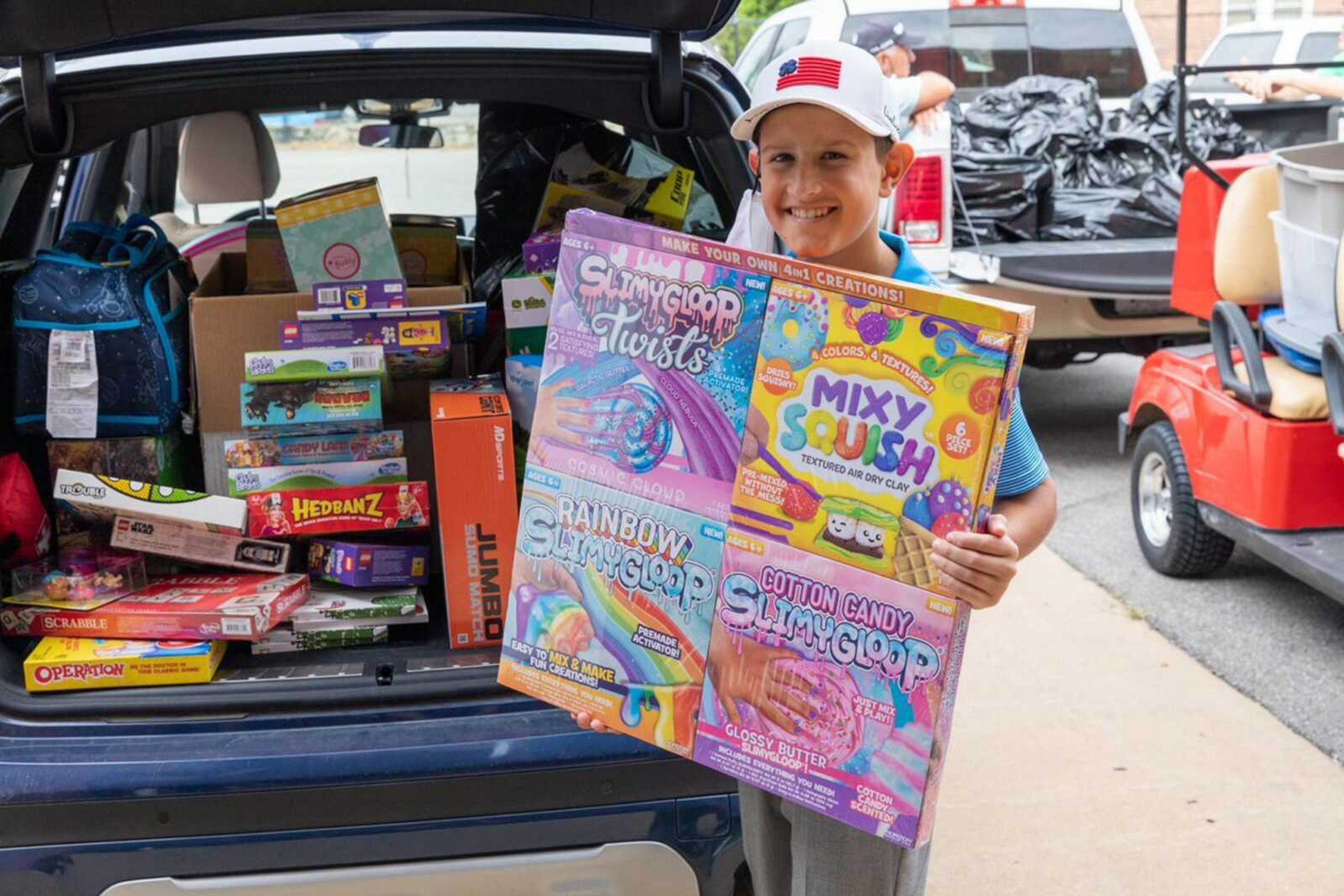 Jimmy Williams, 13, of Jackson poses with toys he donated to Cardinal Glennon Children's Hospital in St. Louis on his birthday, Oct. 1.