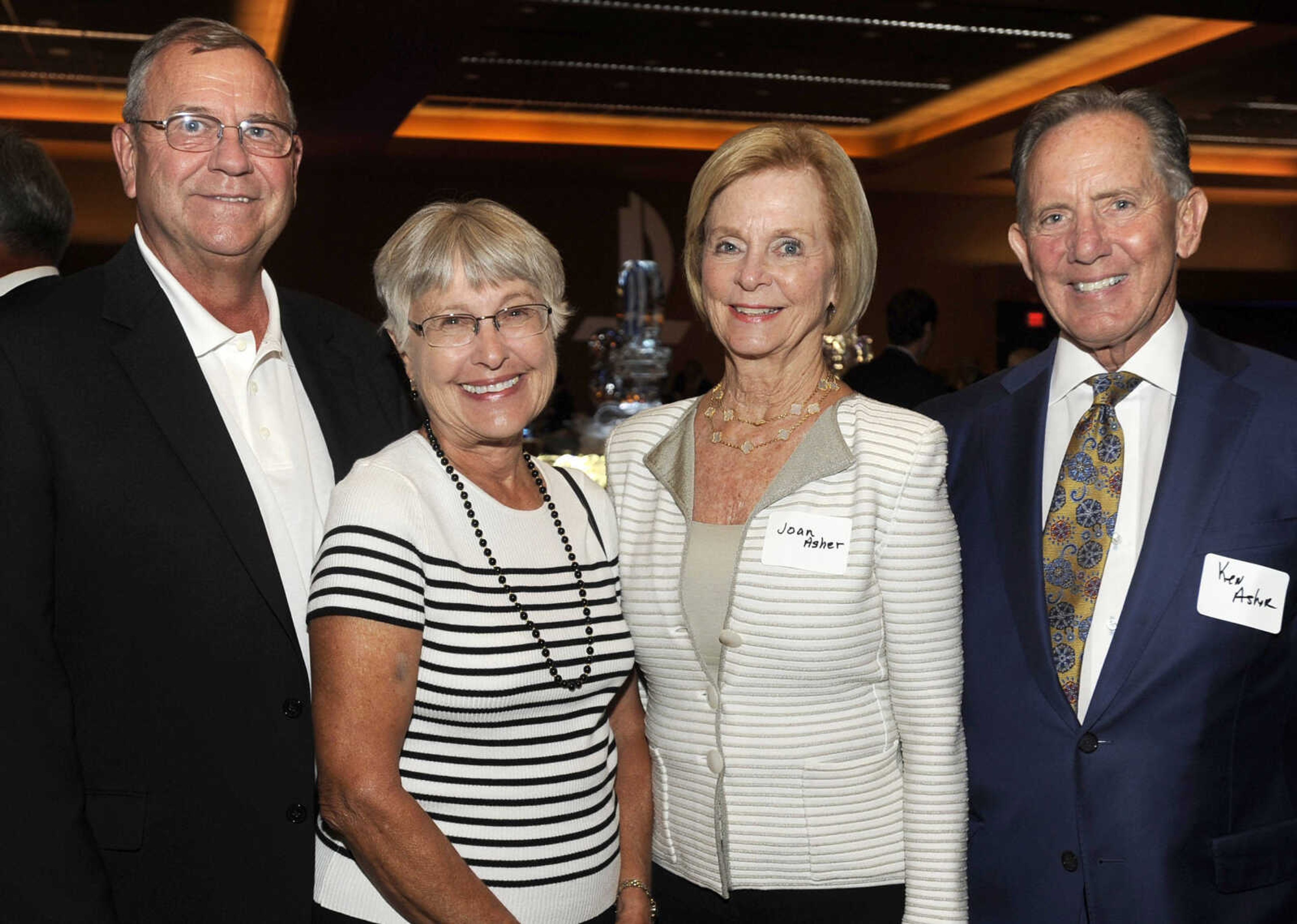 FRED LYNCH ~ flynch@semissourian.com
John and Mary Sue Layton, left, and Joan and Ken Asher pose for a photo Thursday, Aug. 17, 2017 at a retirement reception for Saint Francis Healthcare System president and CEO Steven C. Bjelich at Isle Casino Event Center.