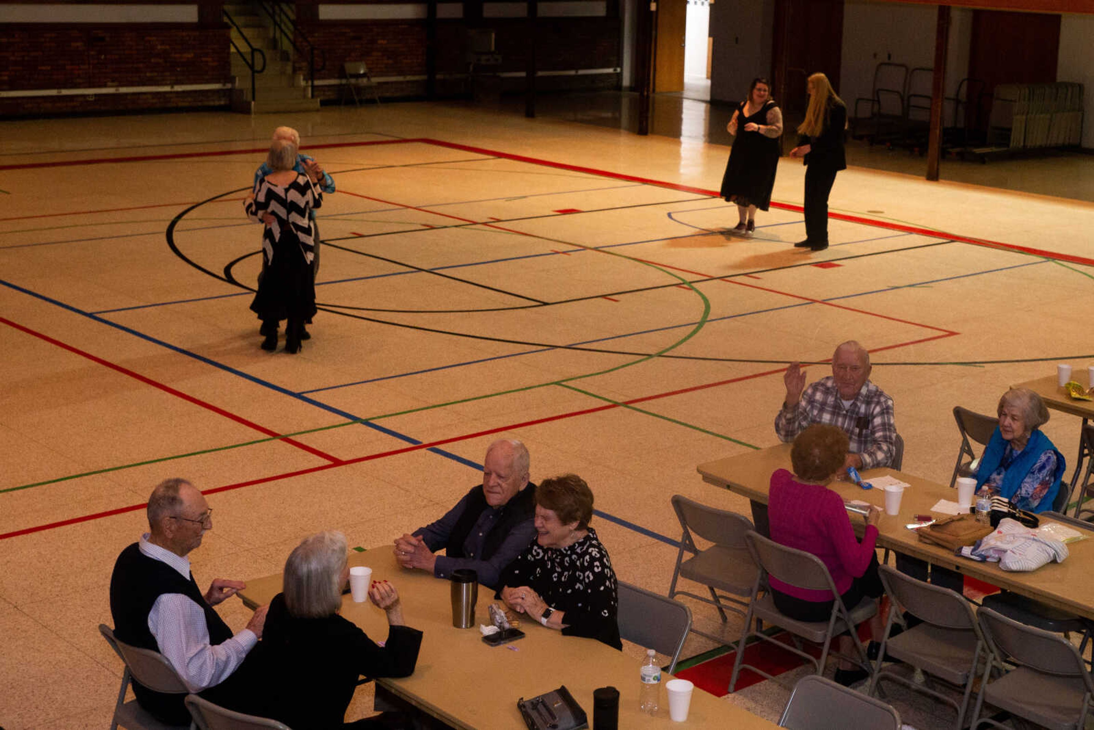 People dance at the community dance and social on&nbsp;on Thursday, Feb. 16&nbsp;at the AC Brase Arena.