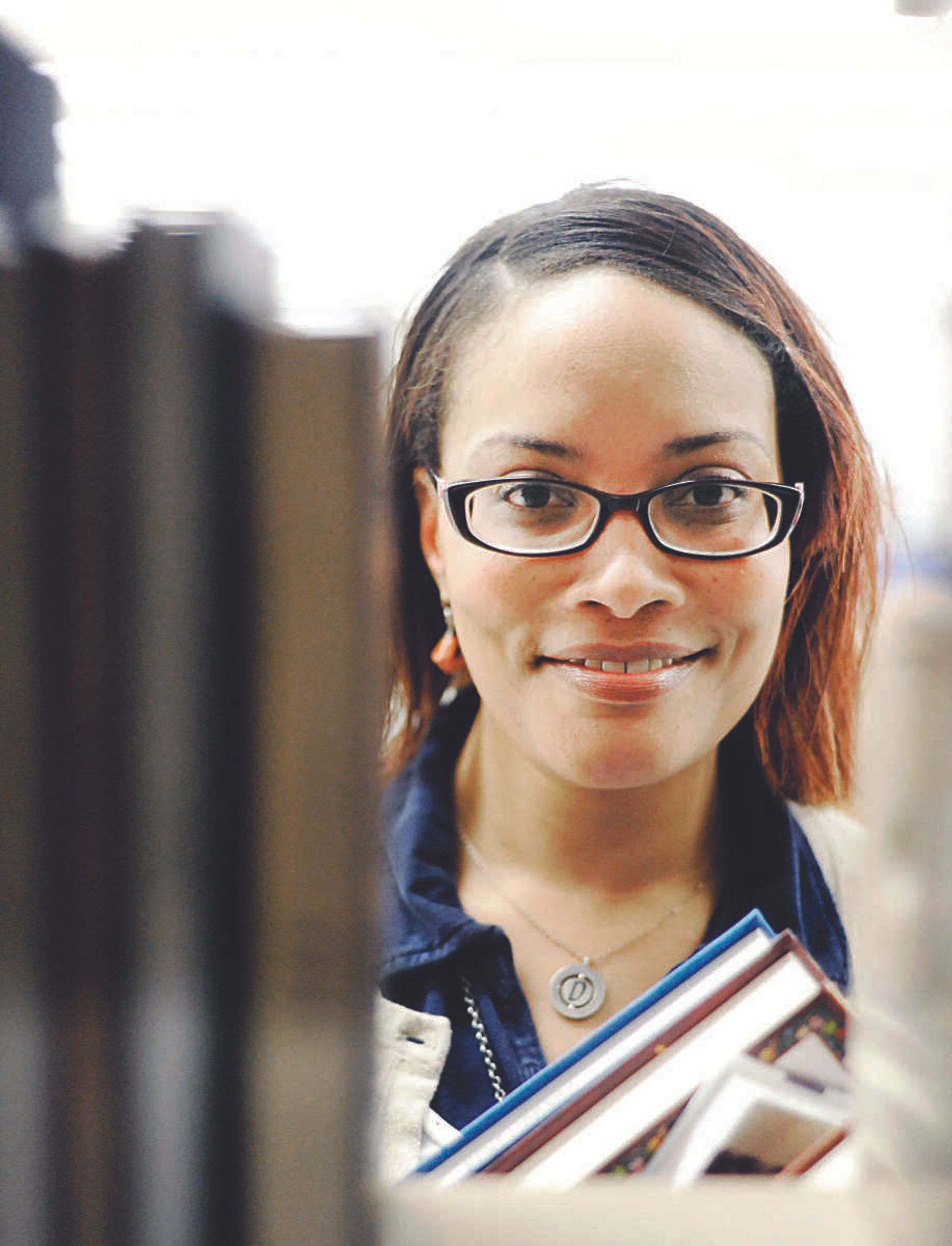 Cutline Email/Stock:Daenel Vaughn-Tucker inside Kent Library at Southeast Missouri State University. (Laura Simon)