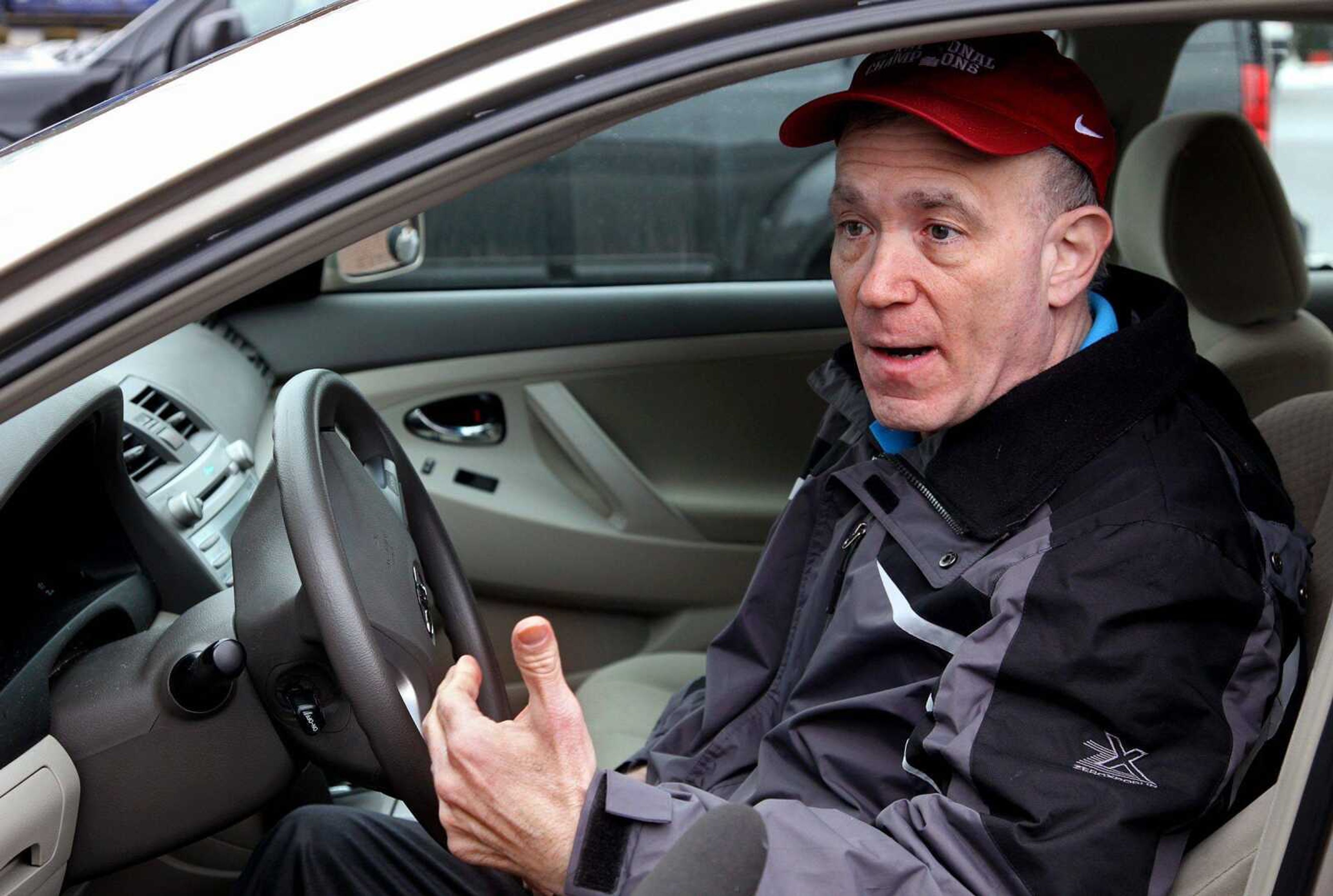 Stewart Stogel of Mount Vernon, N.Y., speaks Wednesday about the problems with his 2009 Toyota Camry while sitting in a parking lot in New Rochelle, N.Y. Stogel said he was preparing to take his Camry back to a Toyota dealership after previous repairs had not solved an acceleration problem. (CRAIG RUTTLE ~ Associated Press)