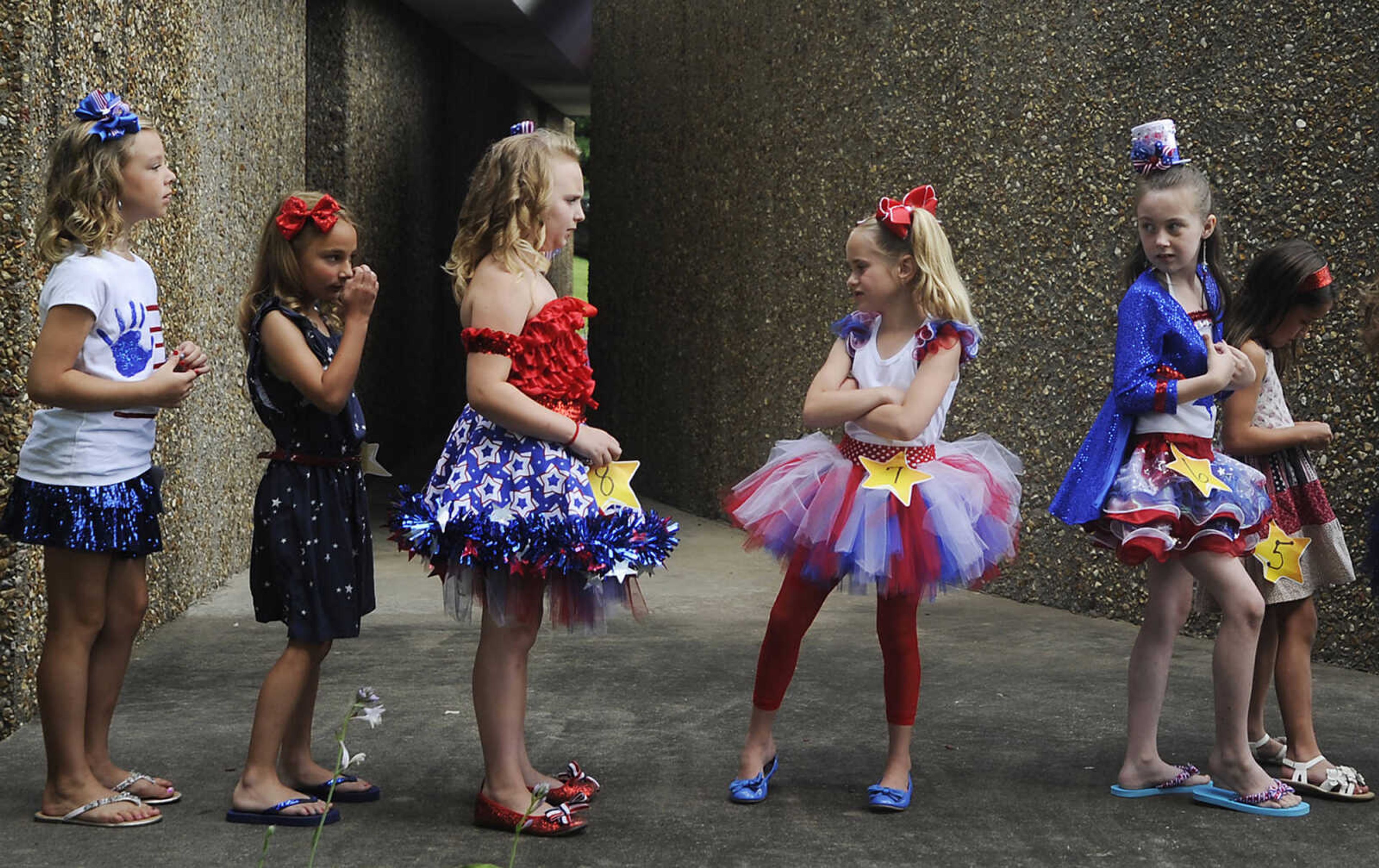 ADAM VOGLER ~ avogler@semissourian.com
Contestants line up back stage during the Little Miss Firecracker Pageant, part of Jackson's Fourth of July Celebration Thursday, July 4, at Jackson City Park.