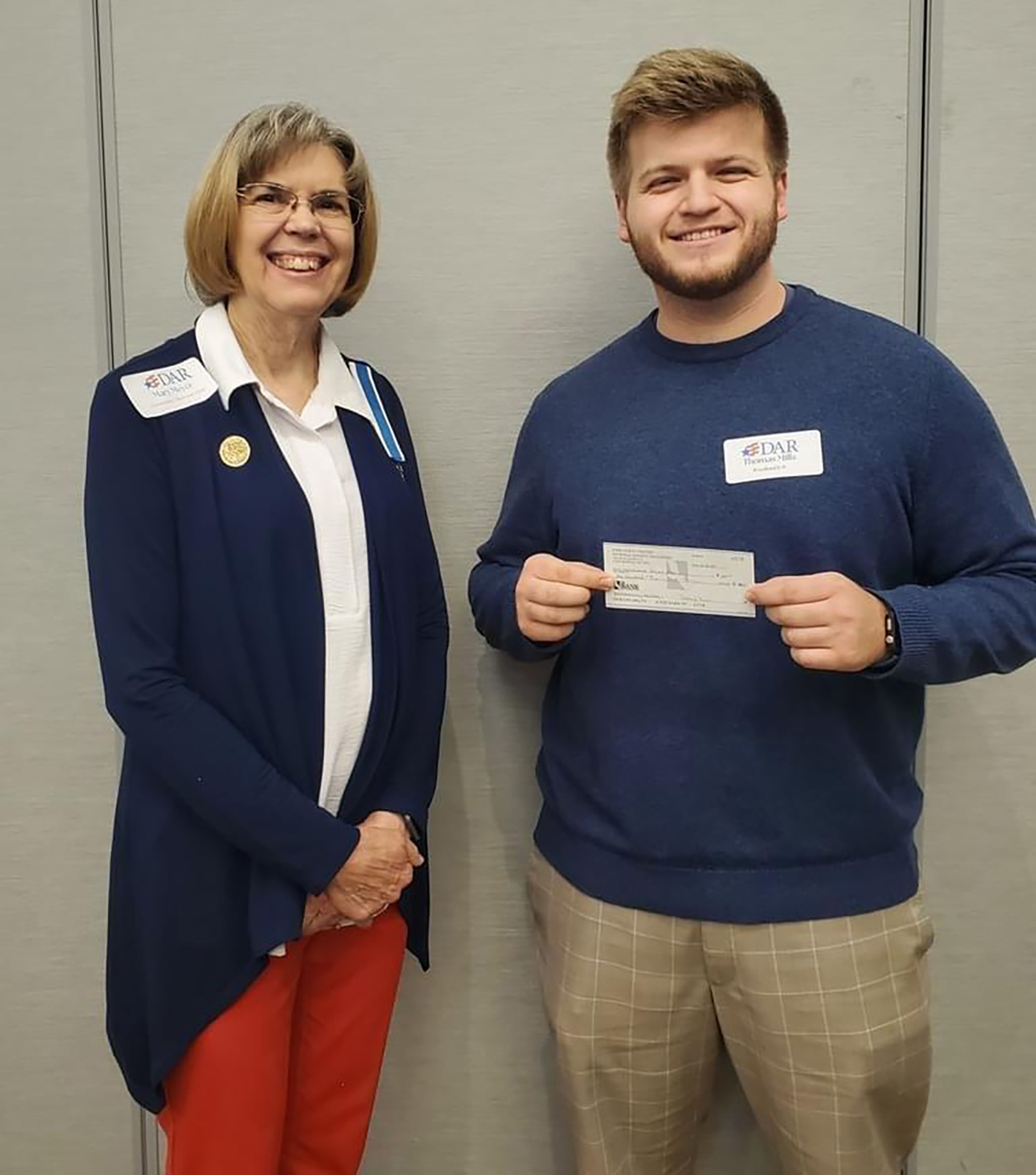 Community Classroom Chapter Chair Mary Meyer and Thomas Mills of Woodland
High School.