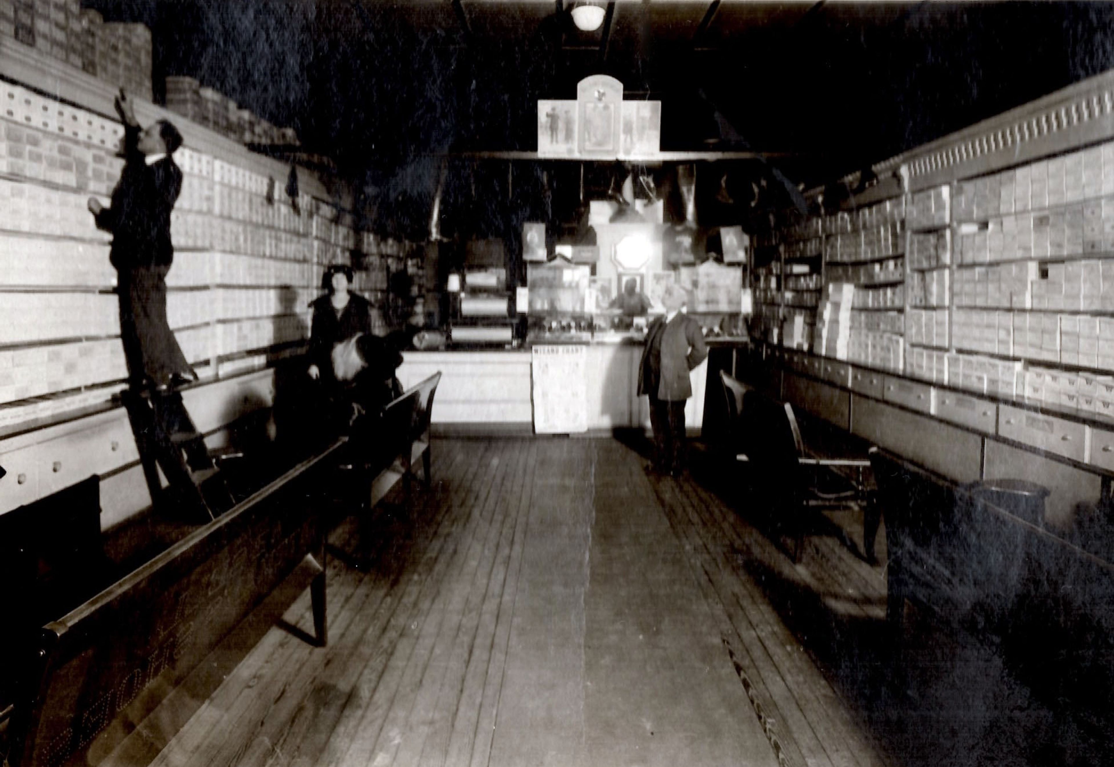 

This undated interior photo of August Lang Shoe Store at 19 N. Main St. in Cape Girardeau is part of the Lang Photo Collection at the Cape Girardeau County Archive Center in Jackson. A crowdsourcing identification project, ID Friday, is underway on the Archive’s Facebook page.