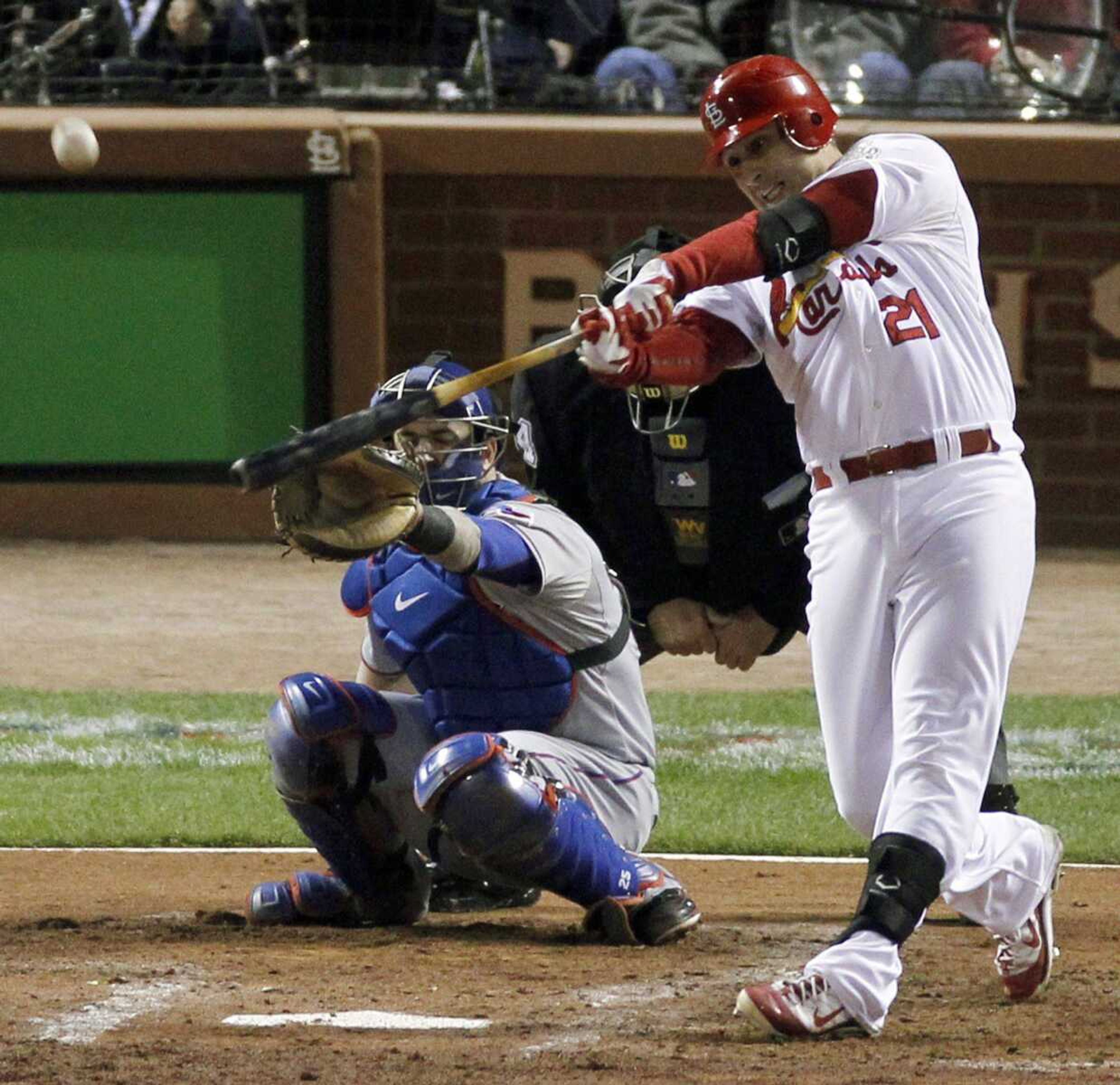 Cardinals outfielder Allen Craig hits a home run during Game 7 of the World Series last season. (AP file)