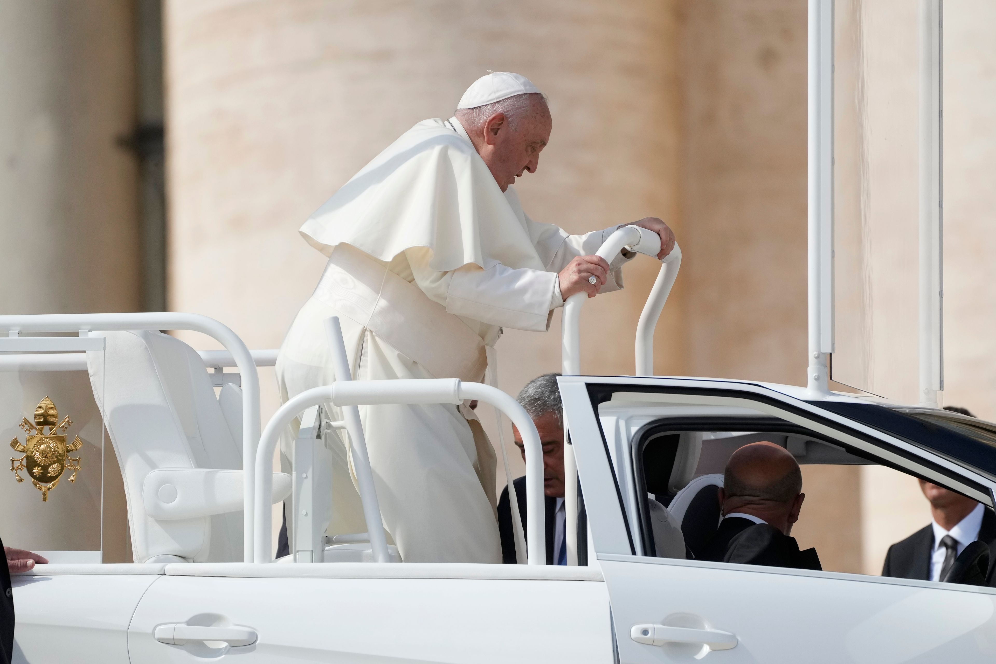 Pope Francis goes on pope-mobile as he leaves after his weekly general audience in St. Peter's Square, at the Vatican, Wednesday, Sept. 25, 2024. (AP Photo/Gregorio Borgia)