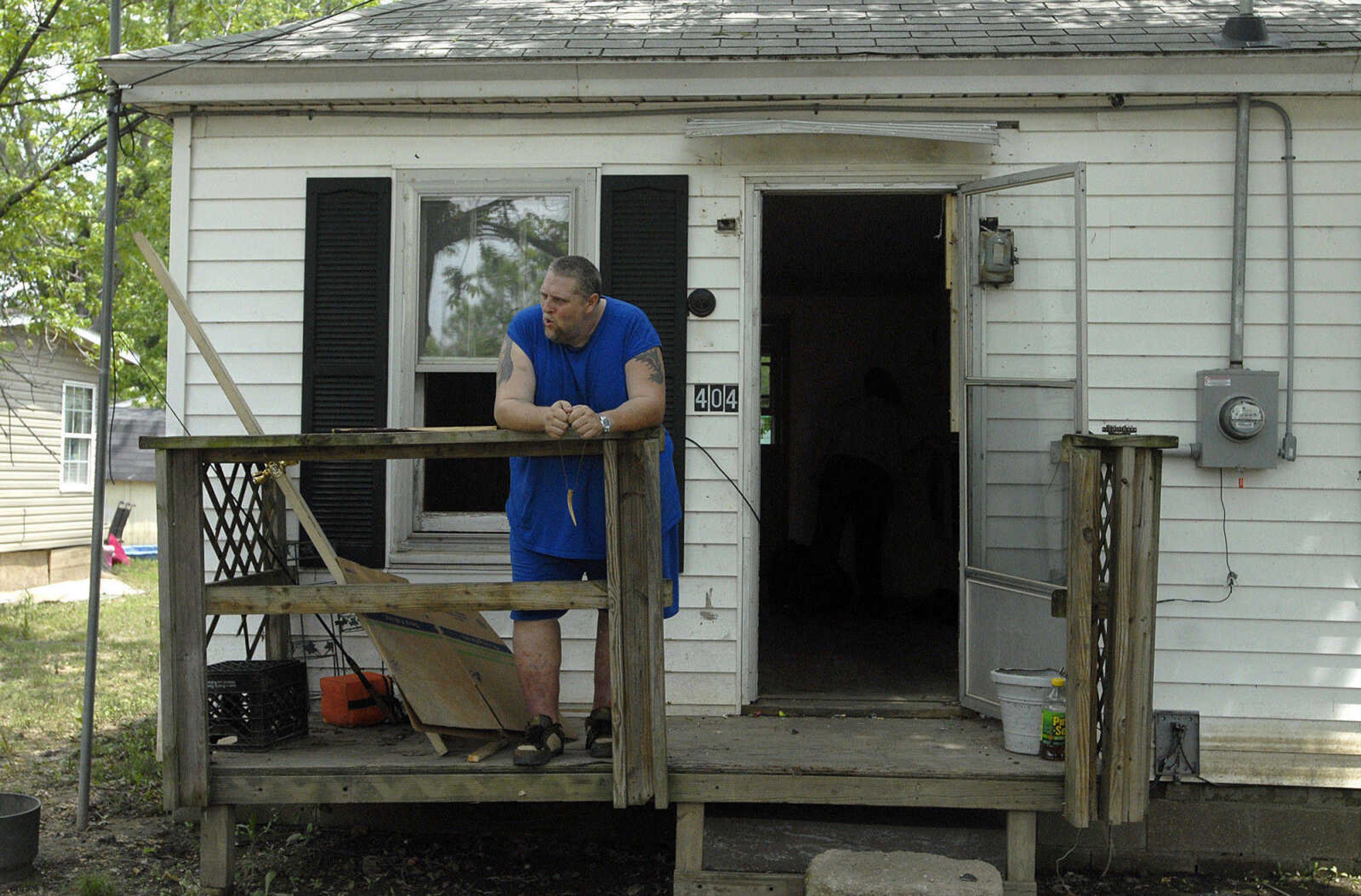 LAURA SIMON~lsimon@semissourian.com
Matt Clark stands on the porch of his flood ravaged home on Boone Street Wednesday, May 11, 2011 in Morehouse.