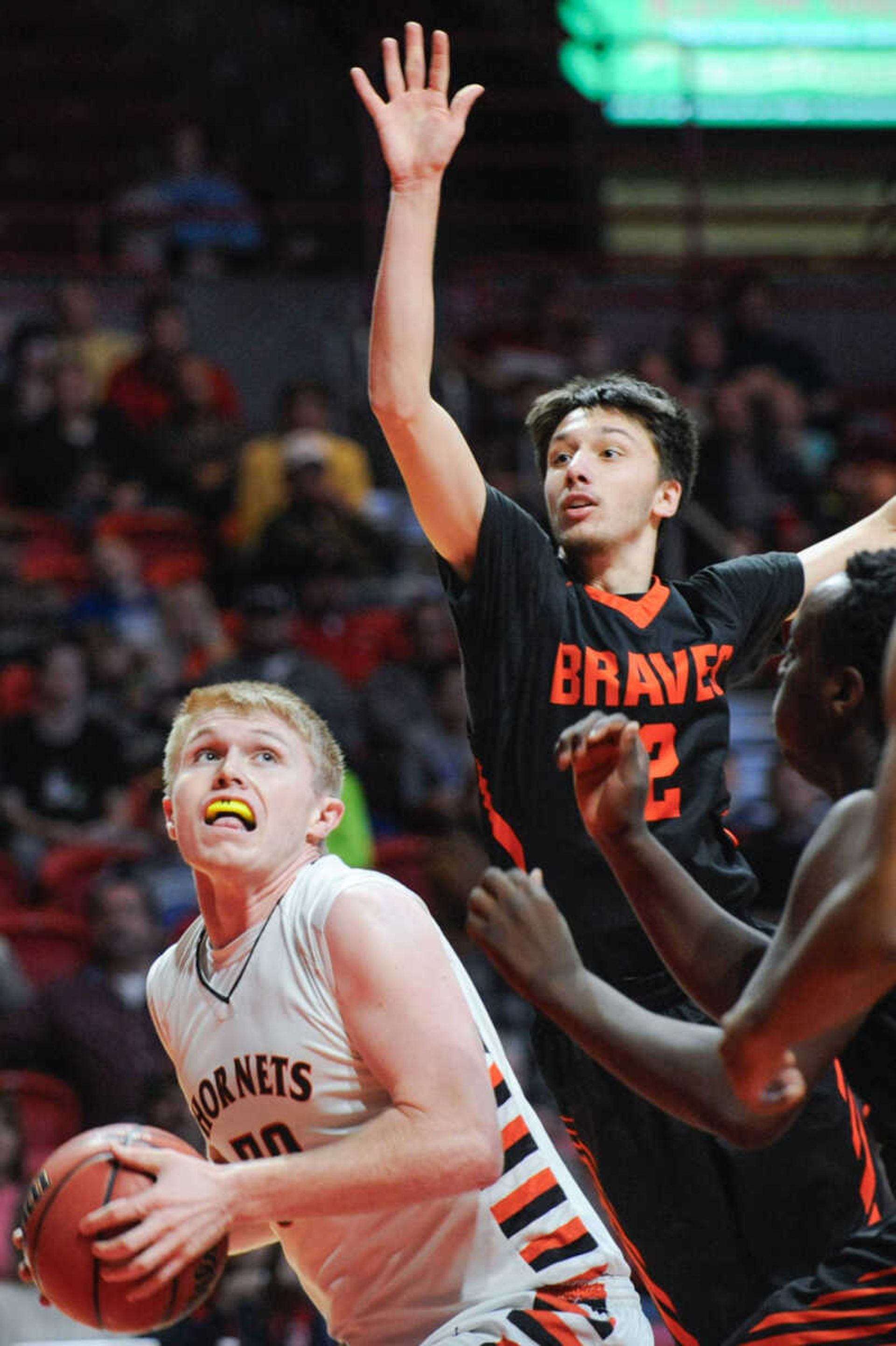 Advance's Dawson Mayo rebounds the ball against Scott County Central during the first quarter in the fifth place game of the Southeast Missourian Christmas Tournament Wednesday, Dec. 30, 2015 at the Show Me Center. (Glenn Landberg)