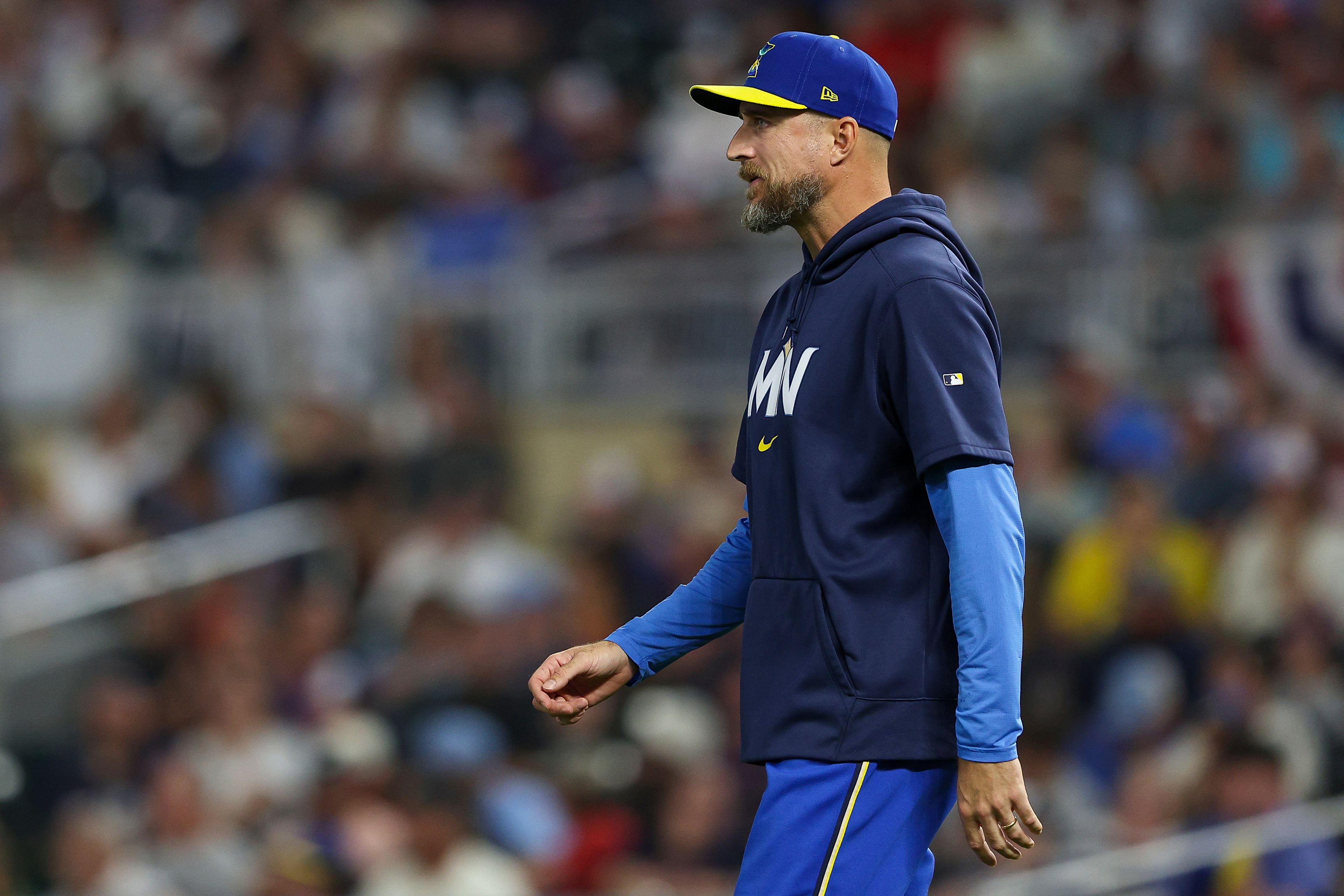 Minnesota Twins manager Rocco Baldelli walks out to the mound during the sixth inning of a baseball game against the Baltimore Orioles, Friday, Sept. 27, 2024, in Minneapolis. (AP Photo/Matt Krohn)