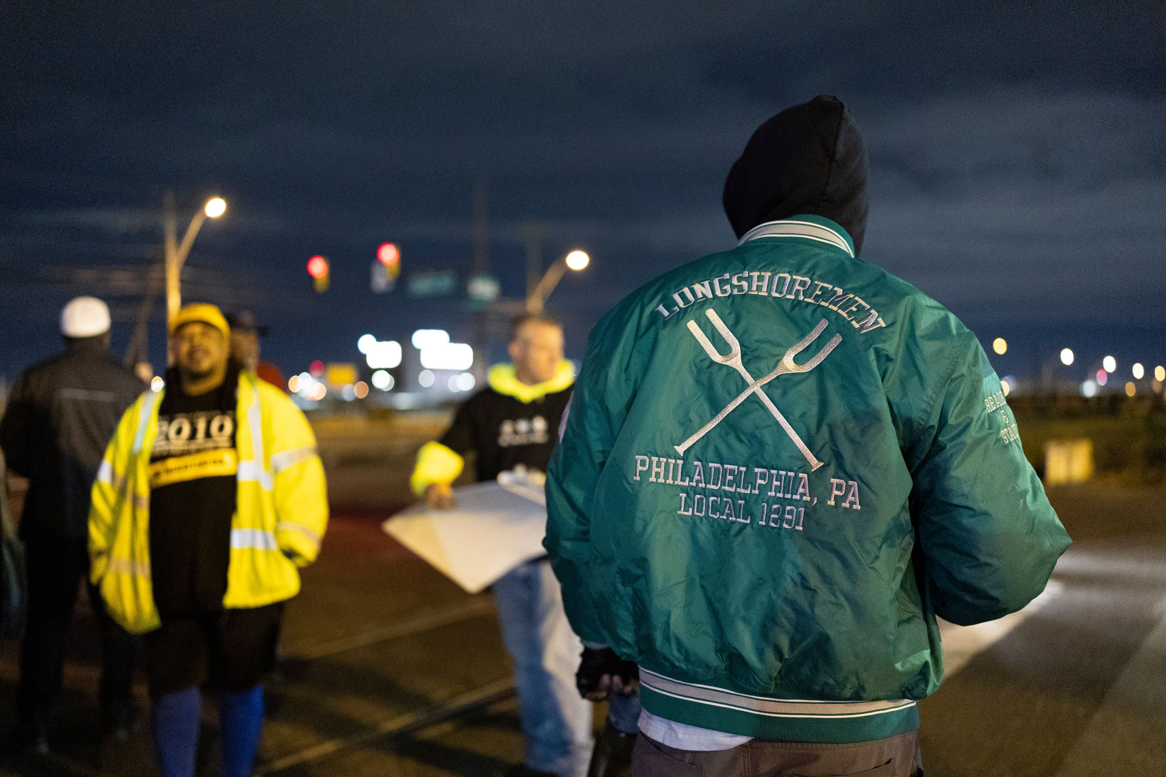 Philadelphia longshoremen assembled outside the Packer Avenue Marine Terminal Port begin to strike as their contract runs out at midnight, Tuesday, Oct. 1, 2024. (AP Photo/Ryan Collerd)