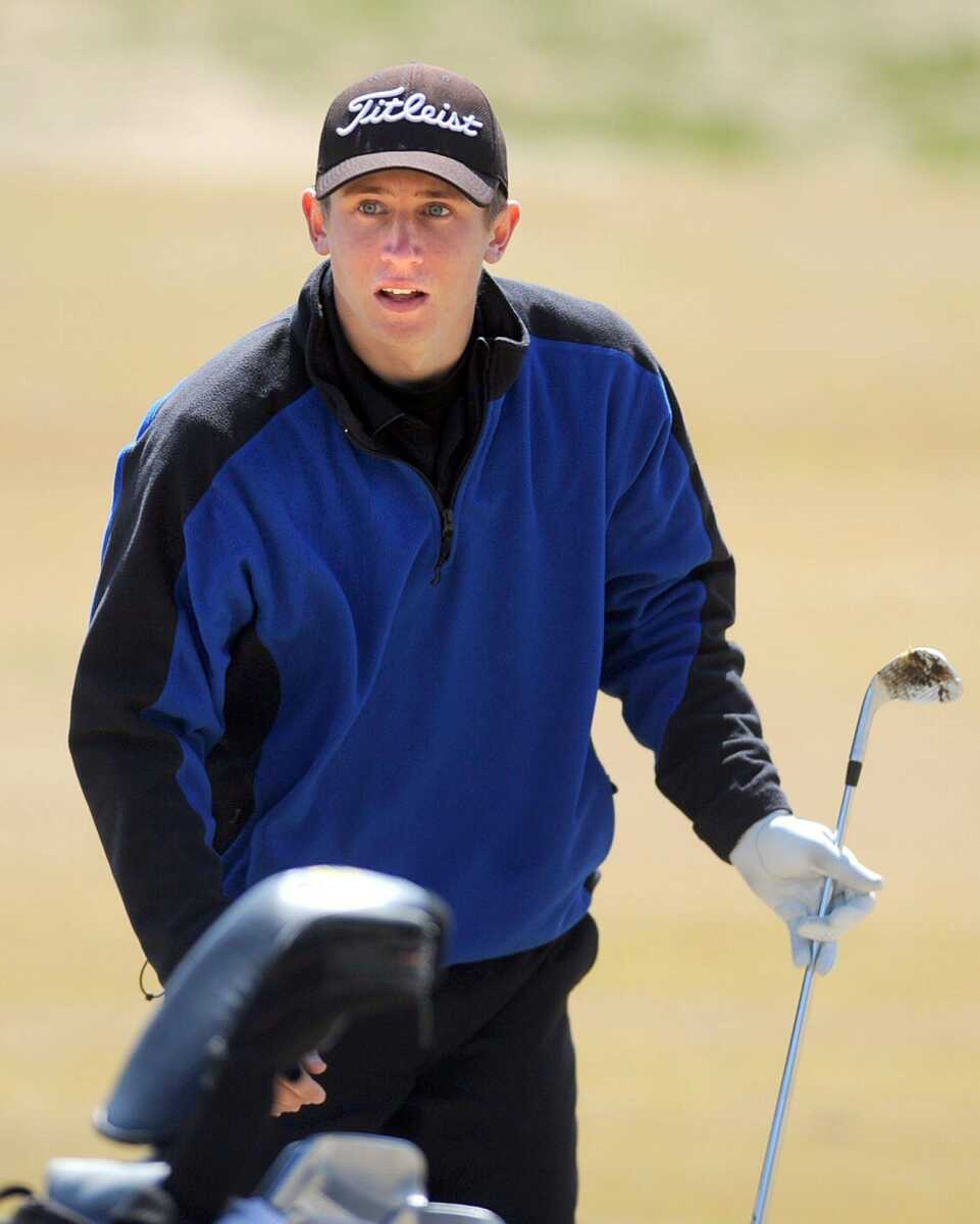 Central&#8217;s Travis Simmons heads back to his golf bag after hitting from the fairway of the seventh hole Monday during the Notre Dame Invitational at Bent Creek Golf Course. Simmons was a medalist with a 74.