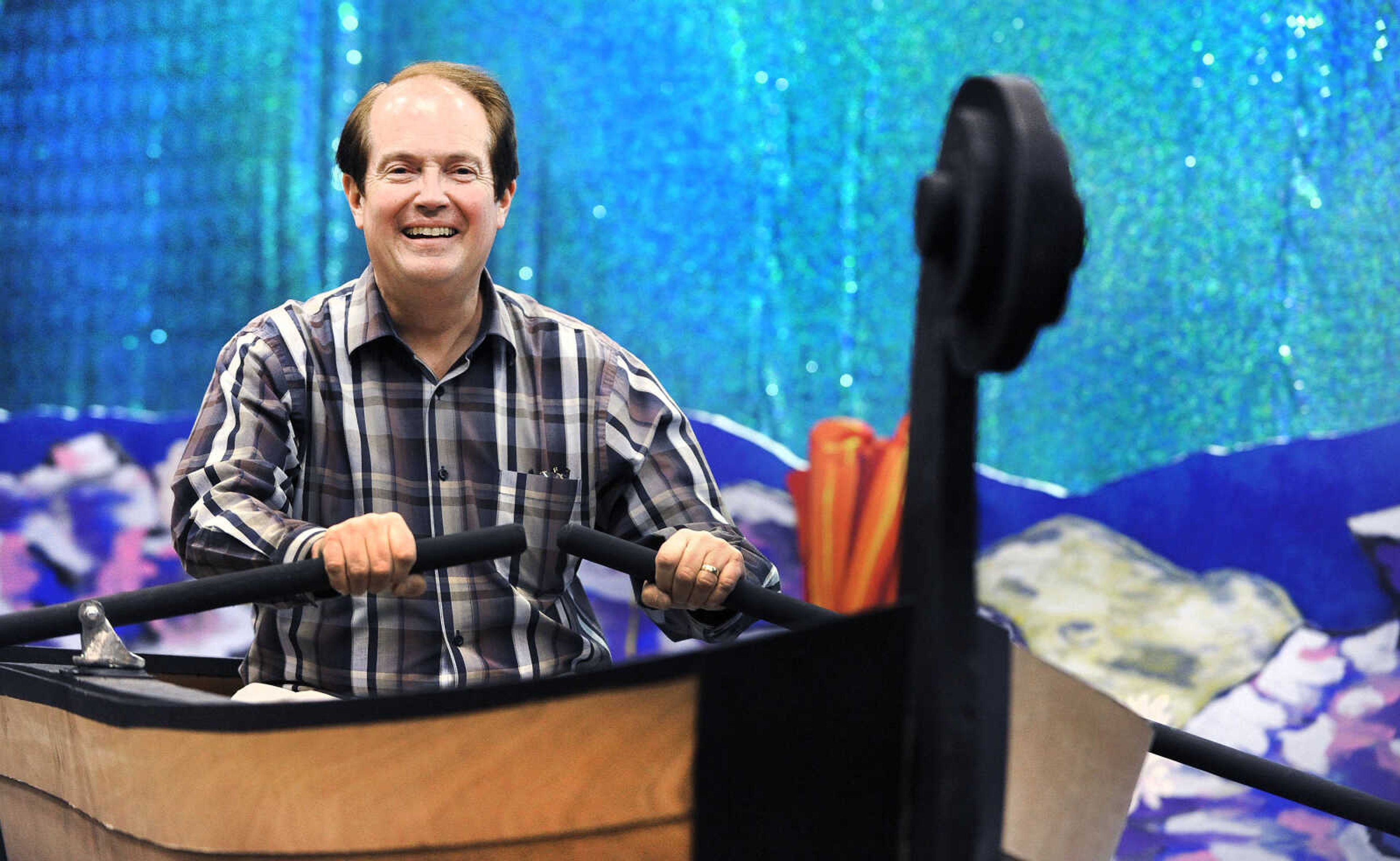 LAURA SIMON ~ lsimon@semissourian.com

Mike Dumey, choir teacher and director of Cape Central Junior High School's production of 'The Little Mermaid', navigates his way across the stage in the prop boat used in the musical, Tuesday, March 1, 2016.