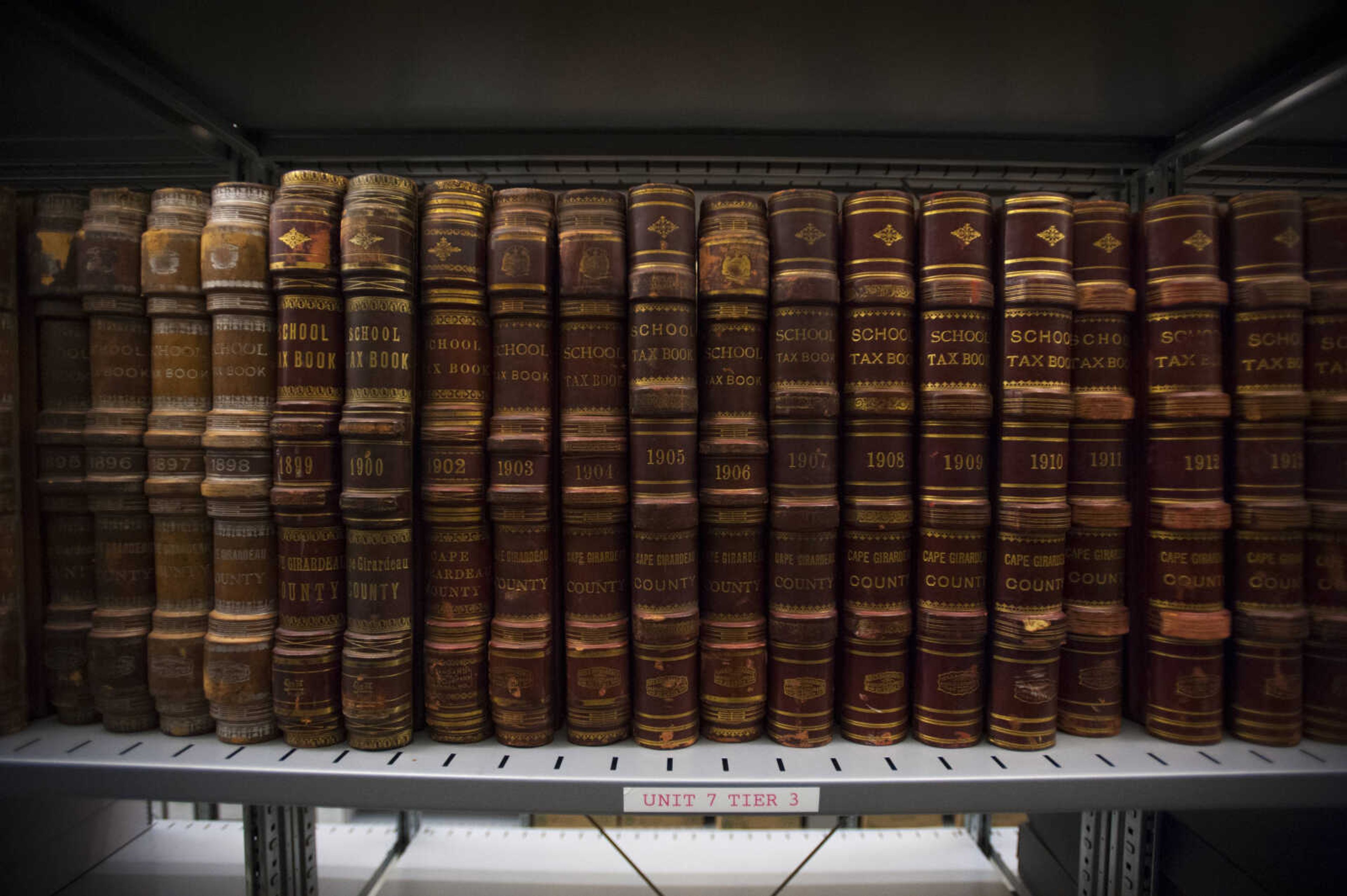 Cape Girardeau County school tax books rest on a shelf Thursday, March 8, 2018, at the Cape Girardeau County Archive Center in Jackson.