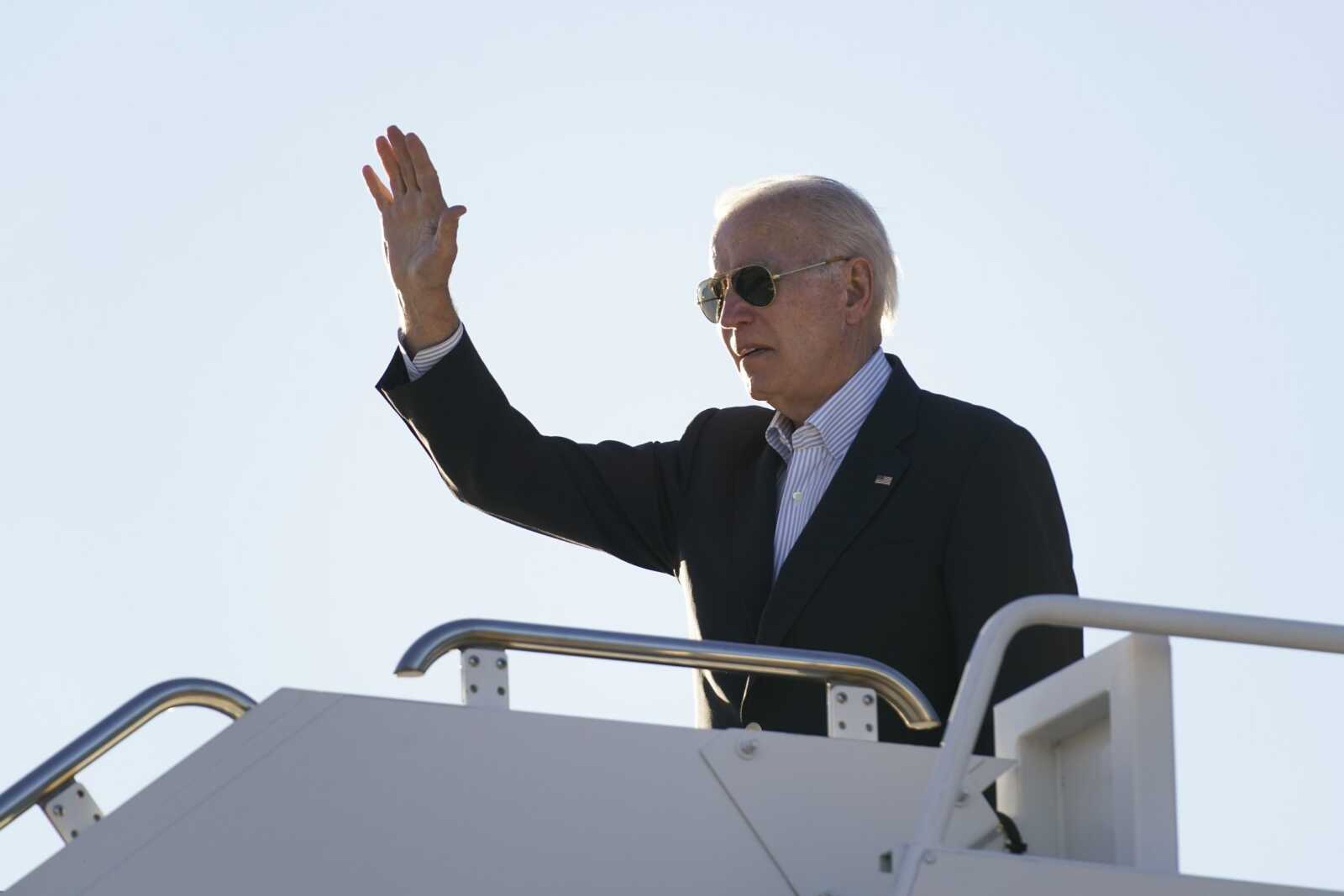 President Joe Biden waves before boarding Air Force One on Sunday at El Paso International Airport in El Paso, Texas, to travel to Mexico City. The Justice Department is reviewing a batch of potentially classified documents found in the Washington office space of President Joe Biden's former institute, White House officials said Monday.