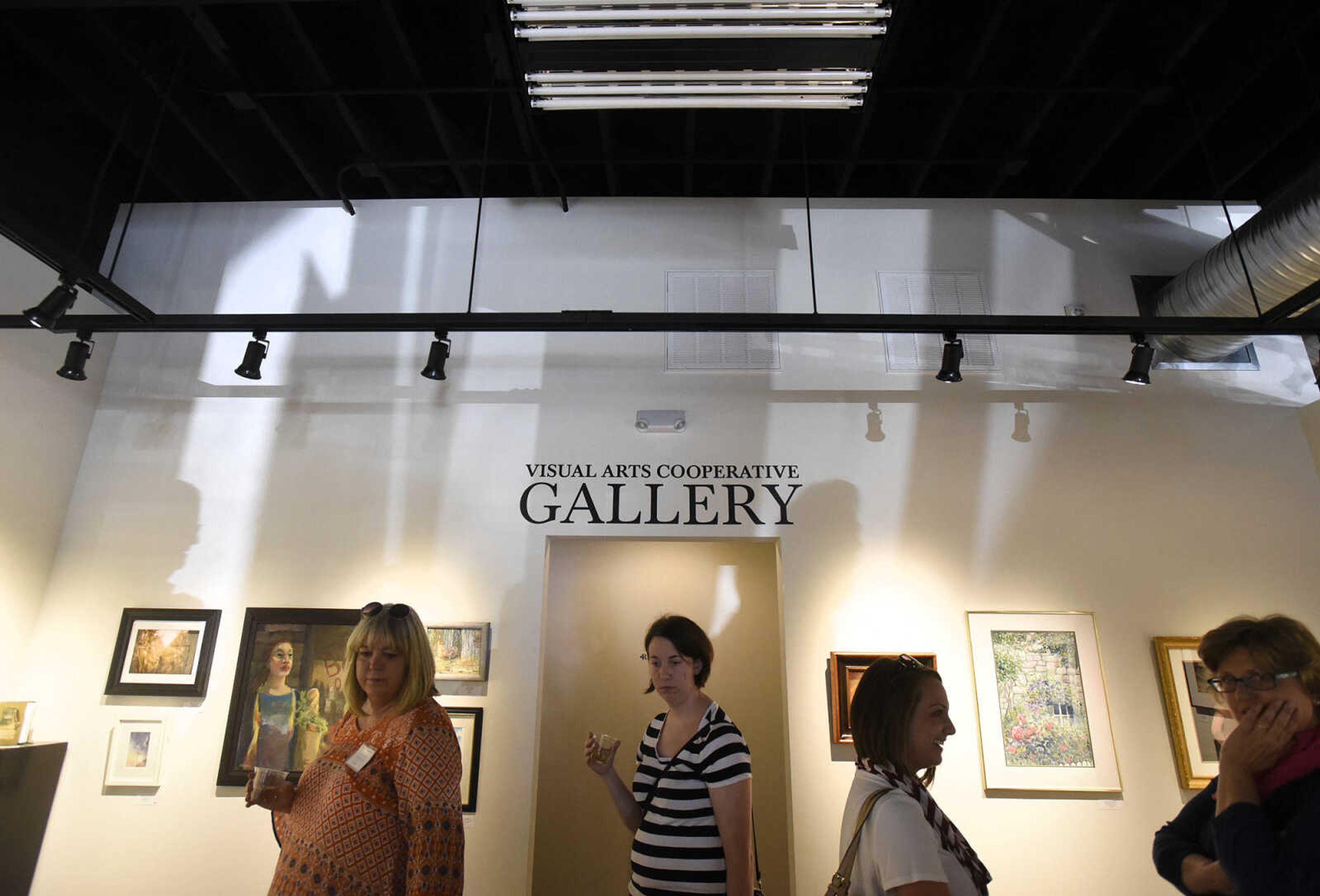 LAURA SIMON ~ lsimon@semissourian.com

People take in the grand opening reception for the 4th annual Members Exhibit at the Arts Council of Southeast Missouri in its new location at 16 North Spanish Street in downtown Cape Girardeau on Friday, Sept. 2, 2016.