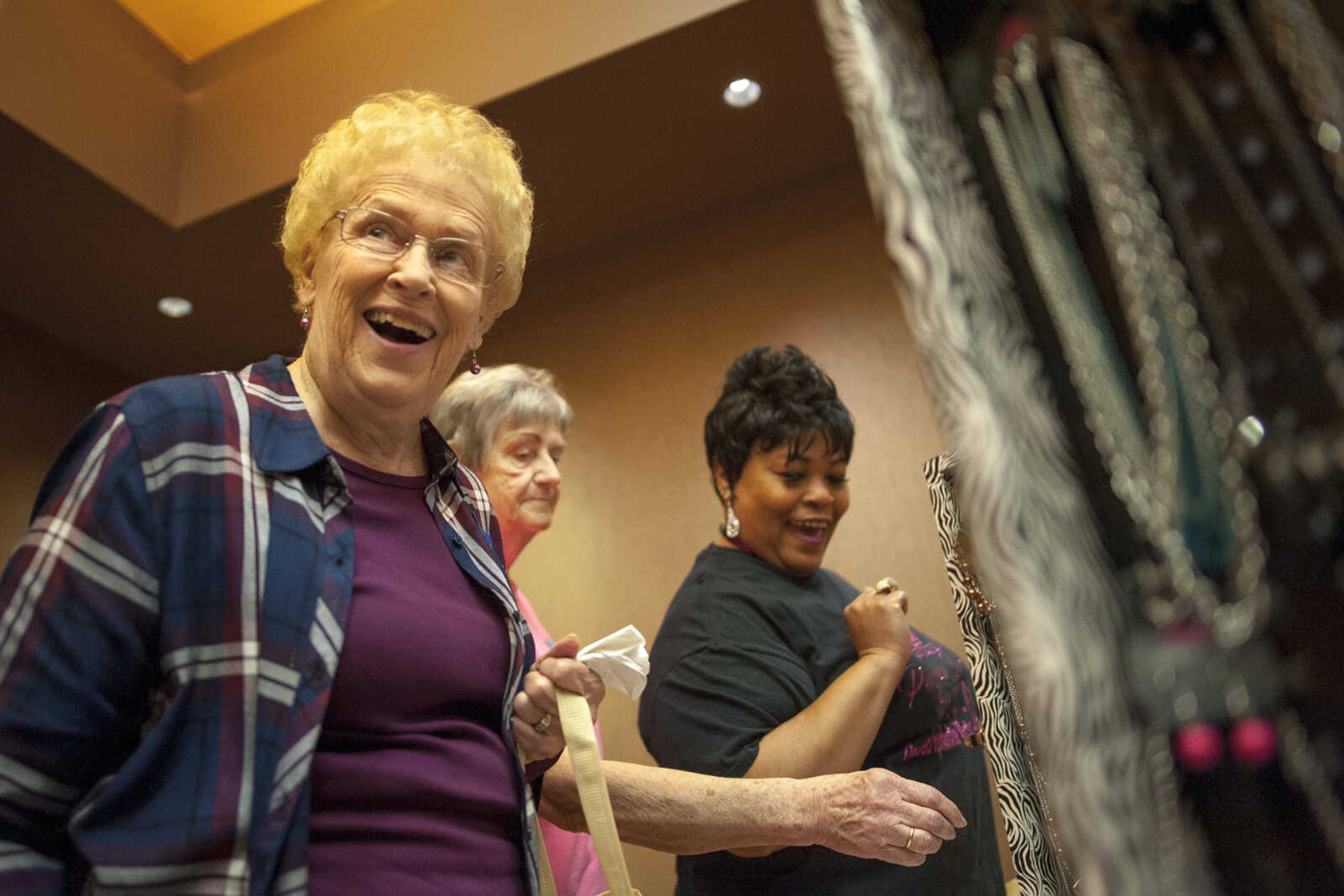 Ann Bodenstein, left, browses a display of jewelry during the TBY Active Living Expo Wednesday, Oct. 9, 2019, at the Isle Casino in Cape Girardeau.