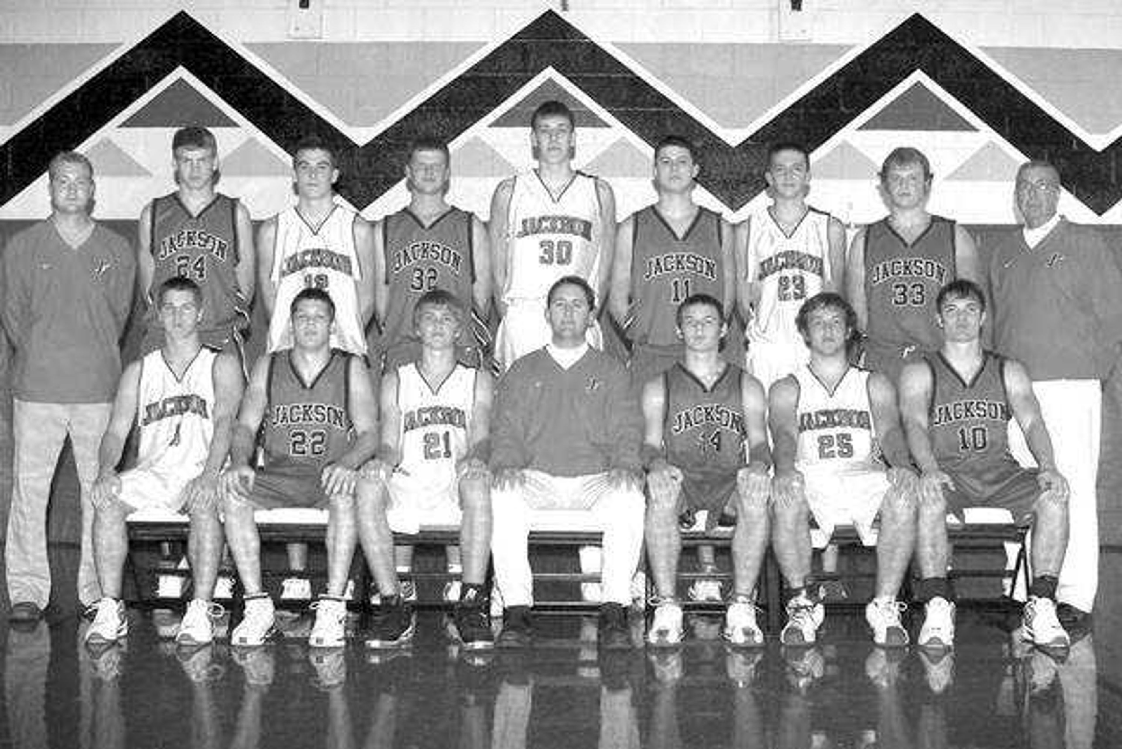 Members of the Jackson boys basketball team, from left: Front -- Logan Lawson, Trey Stone, Jake Leet, head coach Darrin Scott, Josh LaForest, Drue McNeely, Kyle Pridemore; Back -- assistant coach Drew Church, Ryan Leet, Steven Spradlin, Hunter Grantham, Aaron Redecker, Colby Illers, Spencer Goodman, Tyler Grantham, assistant coach Pete Townsend.