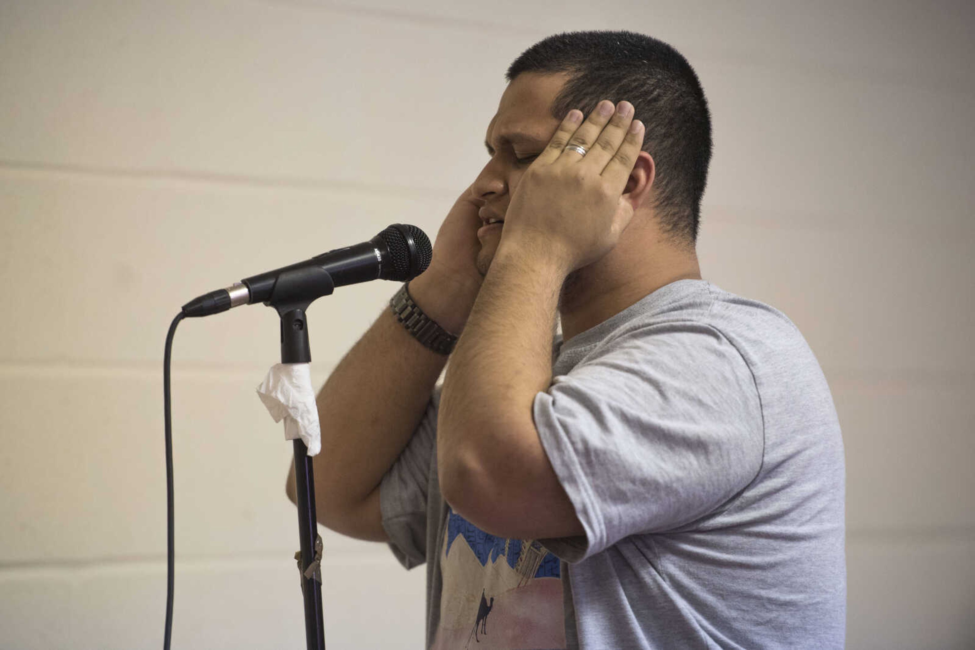 Muddassir Ahmed recites the adhan, an Islamic call to prayer, before participating in the Dhuhr prayer on Friday, May 8, 2020, in Cape Girardeau.