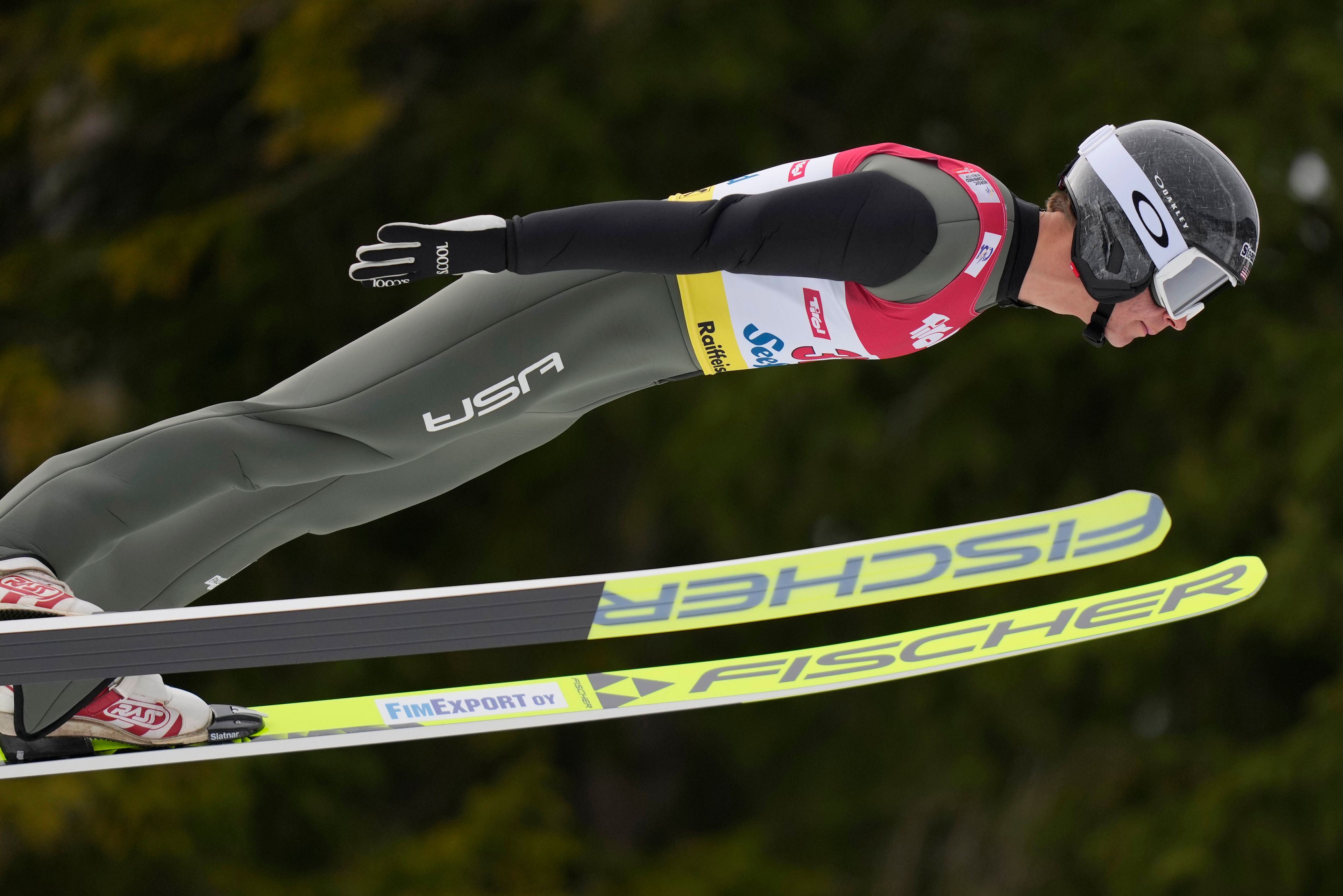 FILE - U.S. Niklas Malacinski competes during the men's Individual Gundersen Ski jumping at the Nordic Combined Triple World Cup in Seefeld, Austria, Feb. 2, 2024. (AP Photo/Matthias Schrader, File)