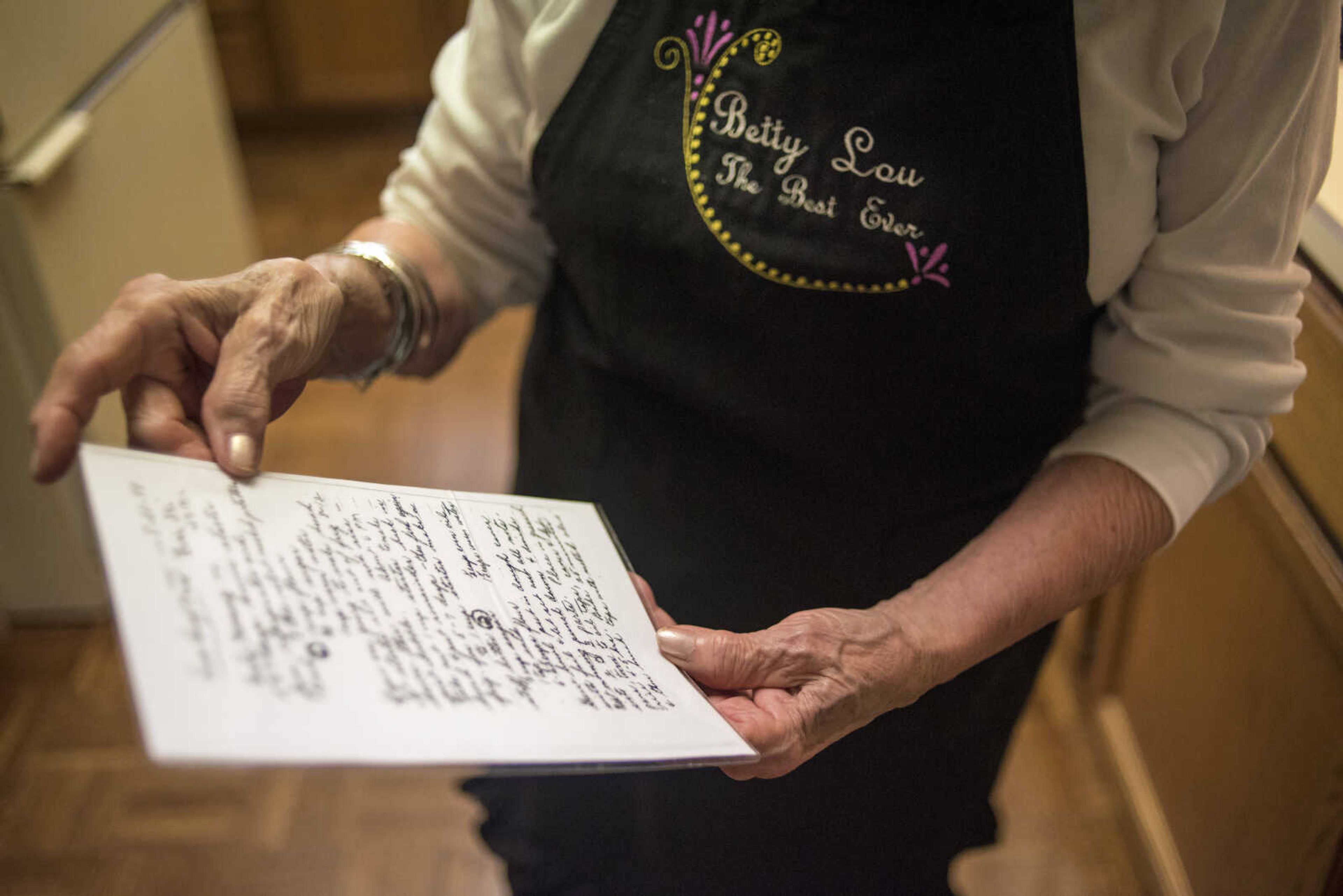 Betty Lou Vogel holds up her sourdough recipe Monday, Oct. 2, 2017 in Cape Girardeau. Betty Lou said they use about 25 pounds of flour twice a month along with three pounds of butter a month.