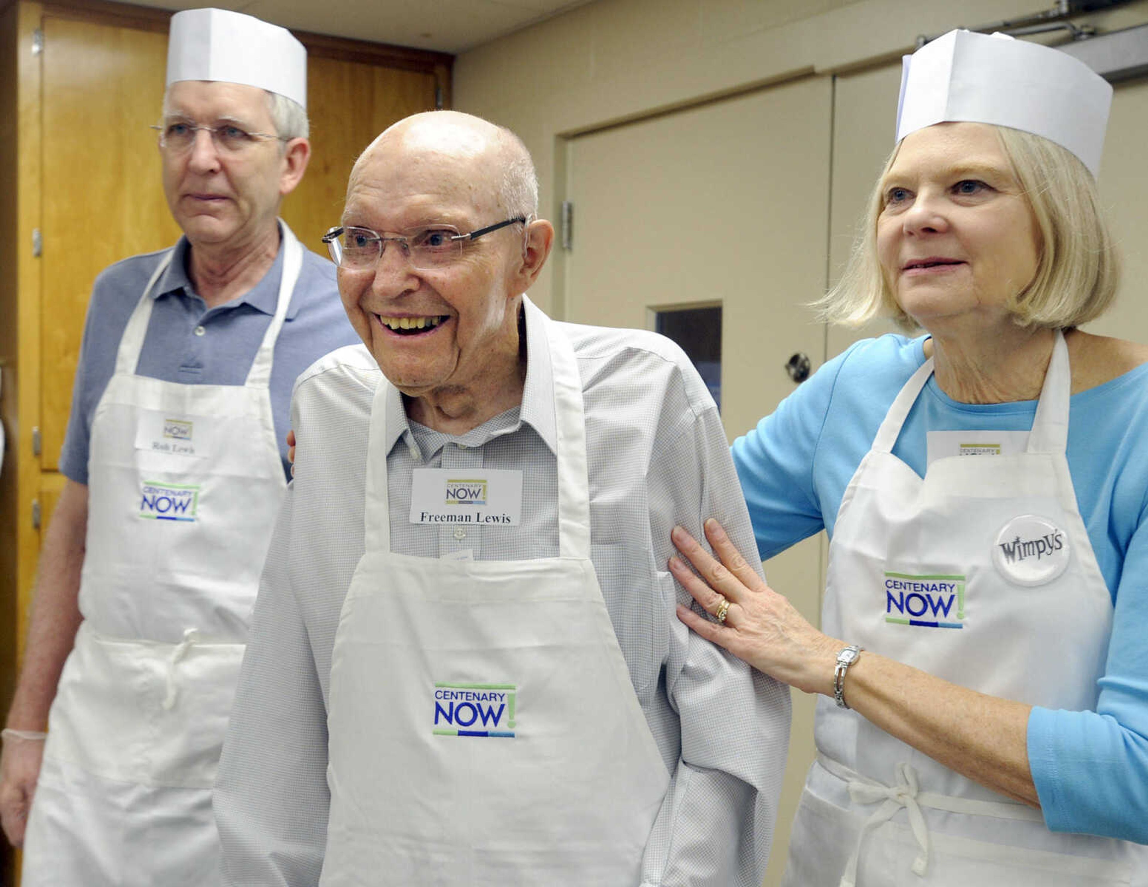 FRED LYNCH ~ flynch@semissourian.com
Freeman Lewis, center, who bought Wimpy's for the Lewis family in 1942, arrives for Wimpy's Day, standing with Rob Lewis and Kathy Lewis Fishel, Saturday, Sept. 19, 2015 at Centenary United Methodist Church in Cape Girardeau.