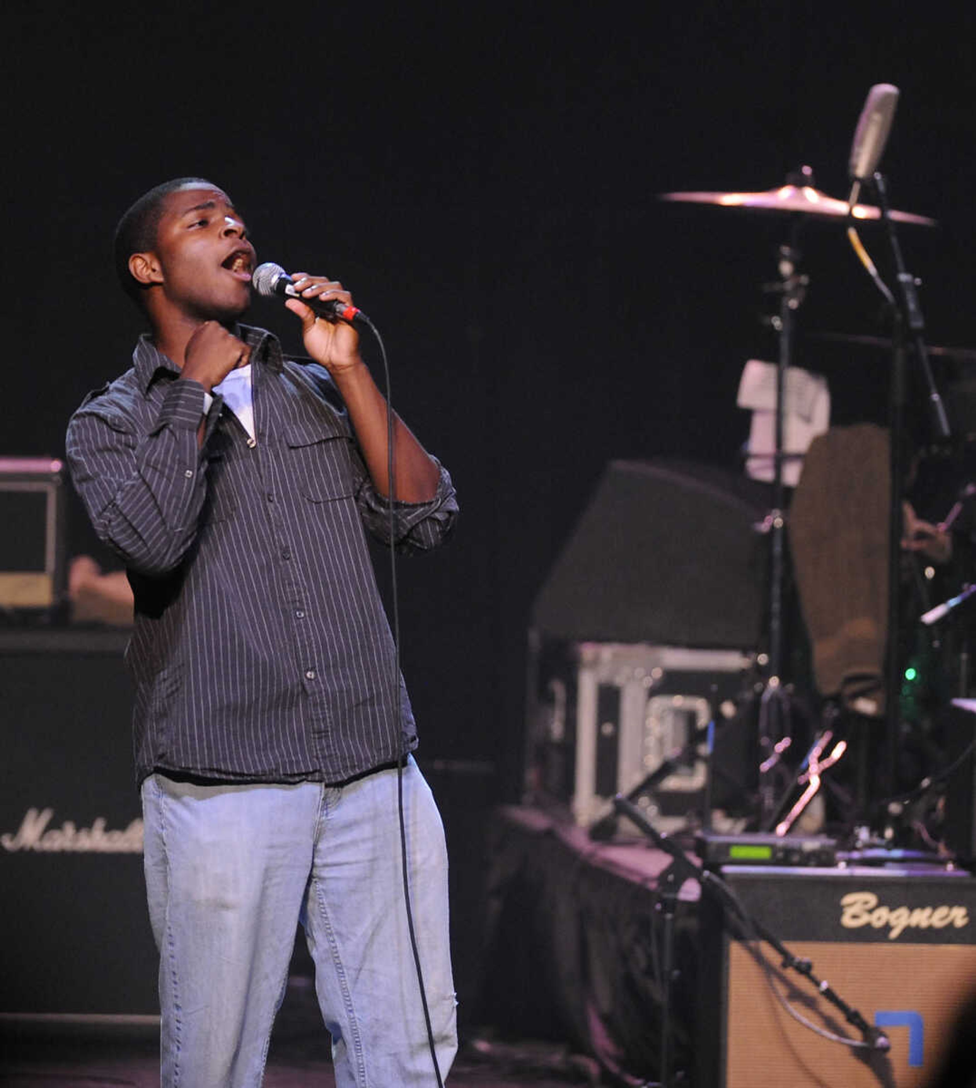 Broderick Twiggs sings with Lauren Dumey, Mary Bauer and Riley Bauer before Rick Springfield performs Saturday, July 21, at the Bedell Performance Hall at the River Campus as part of a fundraiser for Hoops for Life. All of the proceeds will benefit pediatric brain tumor research in memory of Sahara "Hoops" Aldridge. The 13-year-old Cape Girardeau resident lost her battle with brainstem glioma Nov. 5, 2007. Dumey was a classmate of Aldridge.