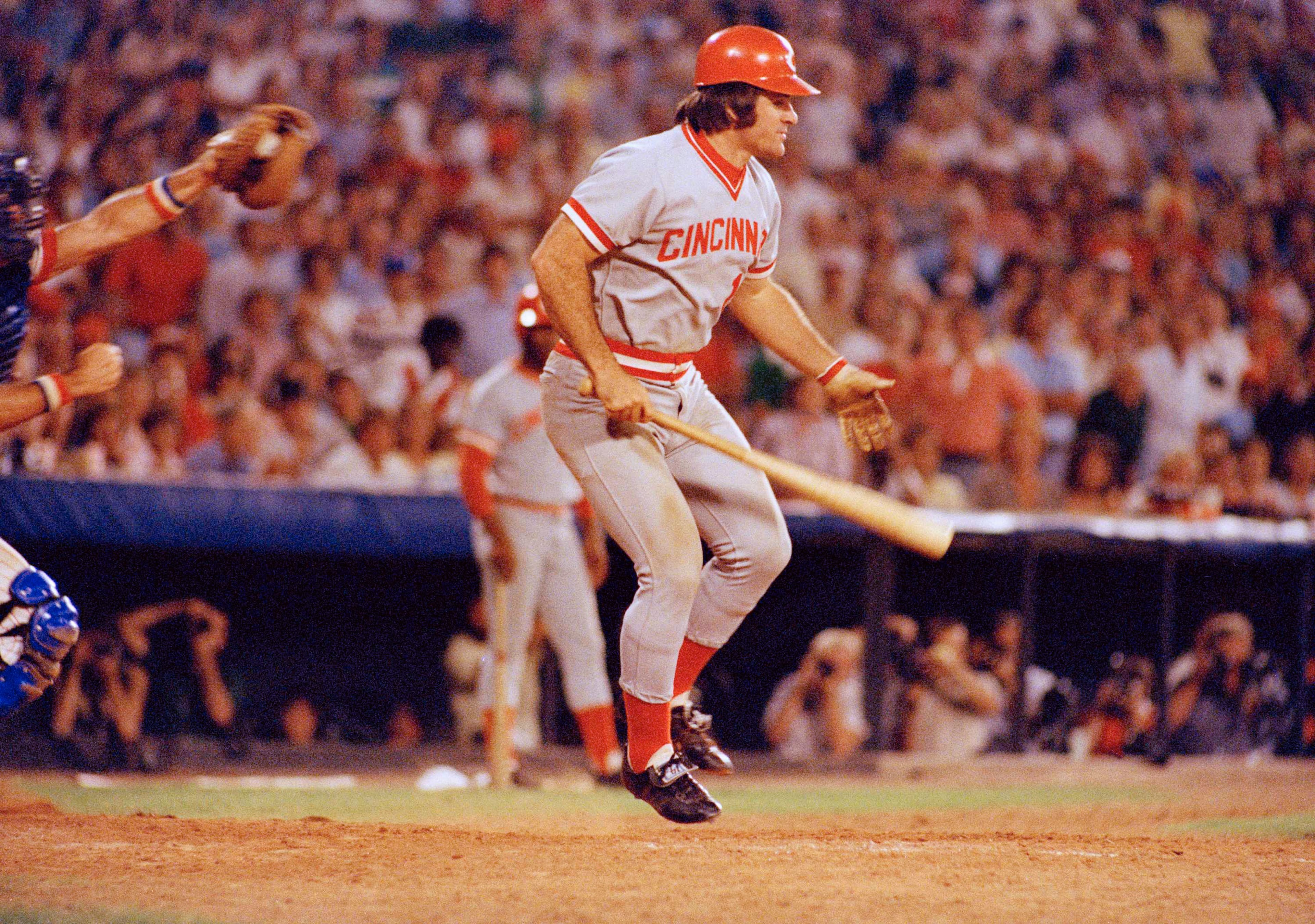 FILE - Pete Rose of the Cincinnati Reds in action at the bat against the Atlanta Braves in Atlanta, Aug. 2, 1978. At left is Atlanta catcher Joe Nolan. (AP Photo, File)