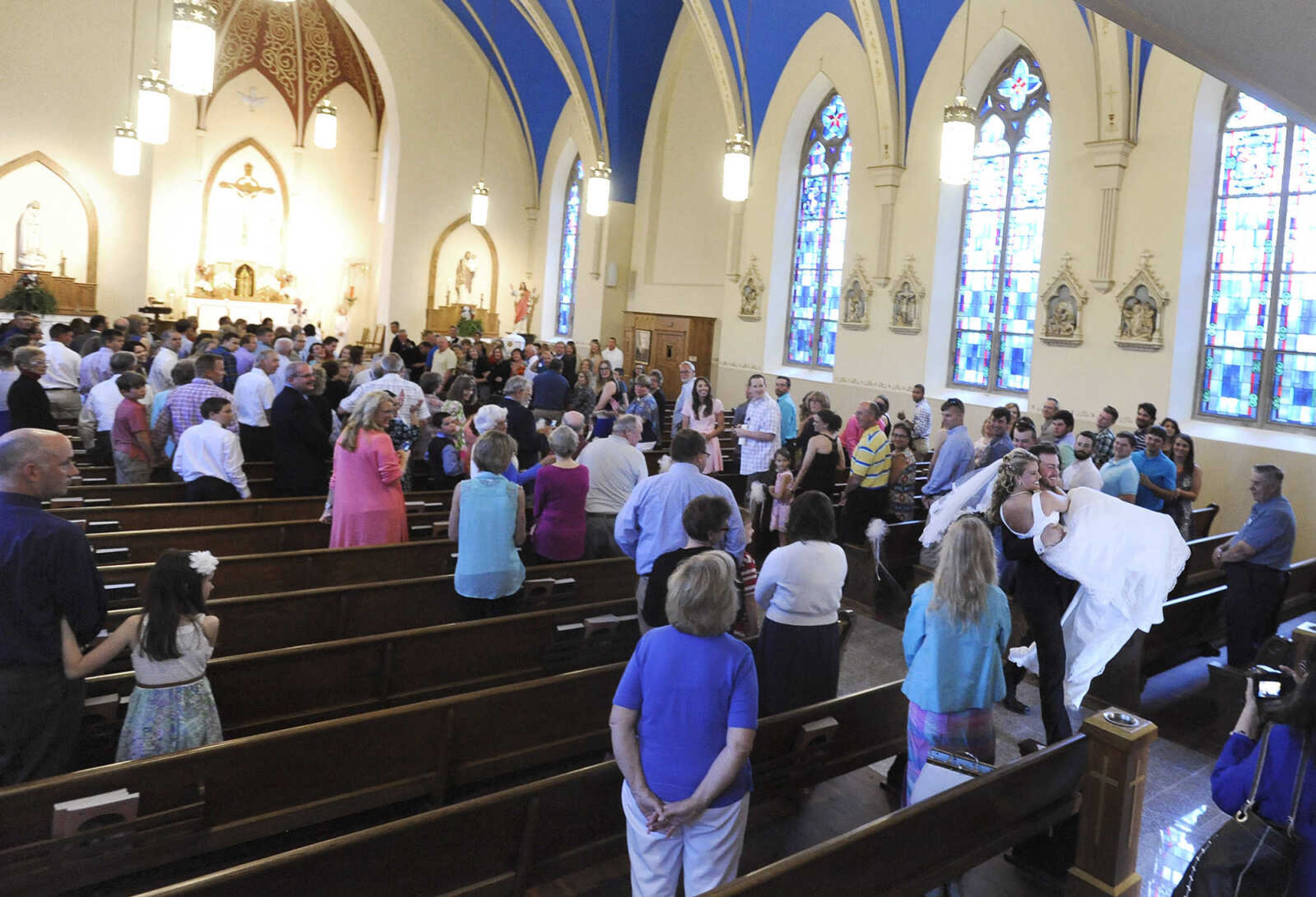 LAURA SIMON ~ lsimon@semissourian.com

The first wedding inside the newly remodeled St. John's Catholic Church in Leopold, Missouri, took place on Saturday, May 21, 2016.