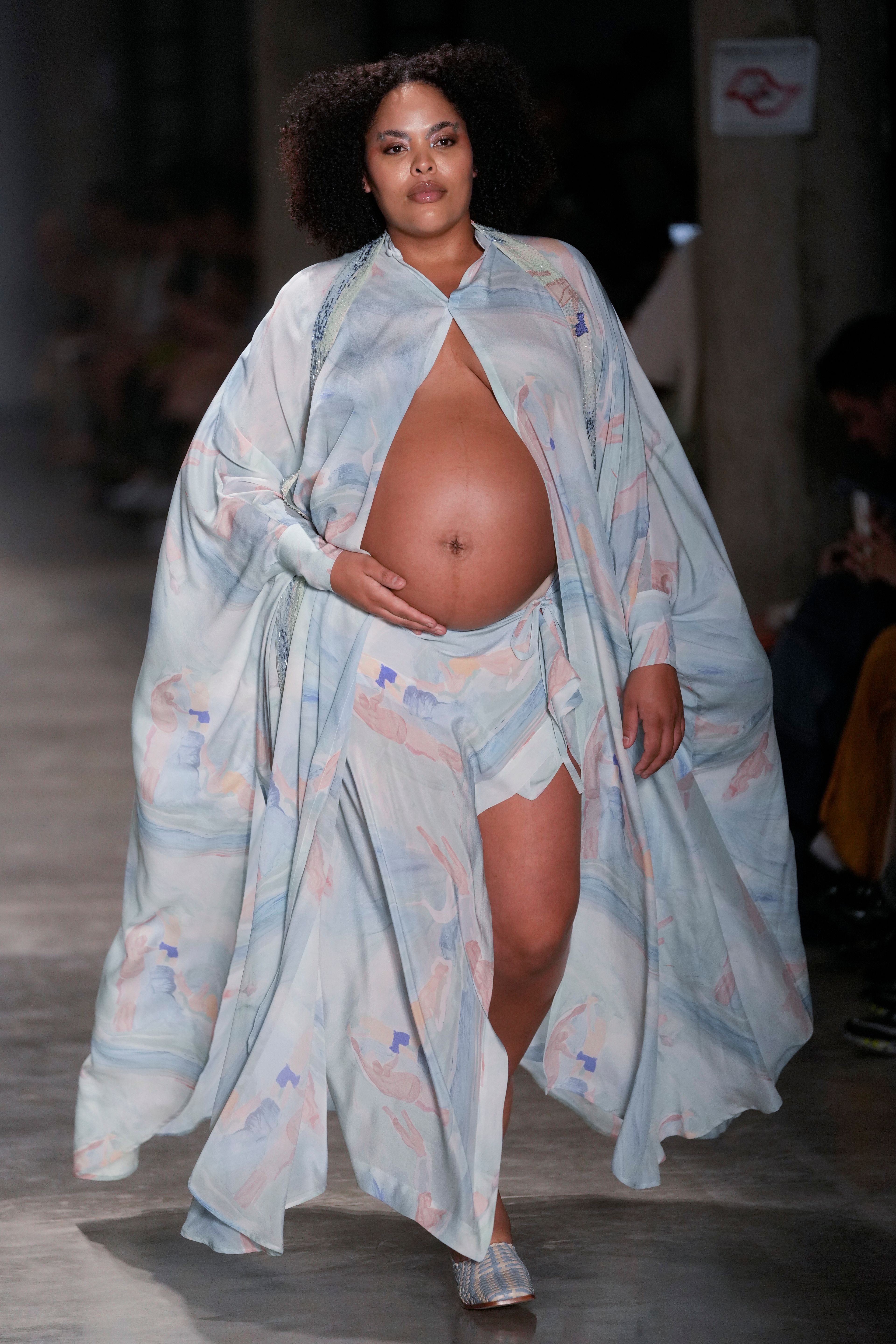 A model wears a creation from the Handred collection during Sao Paulo Fashion Week in Sao Paulo, Thursday, Oct. 17, 2024. (AP Photo/Andre Penner)