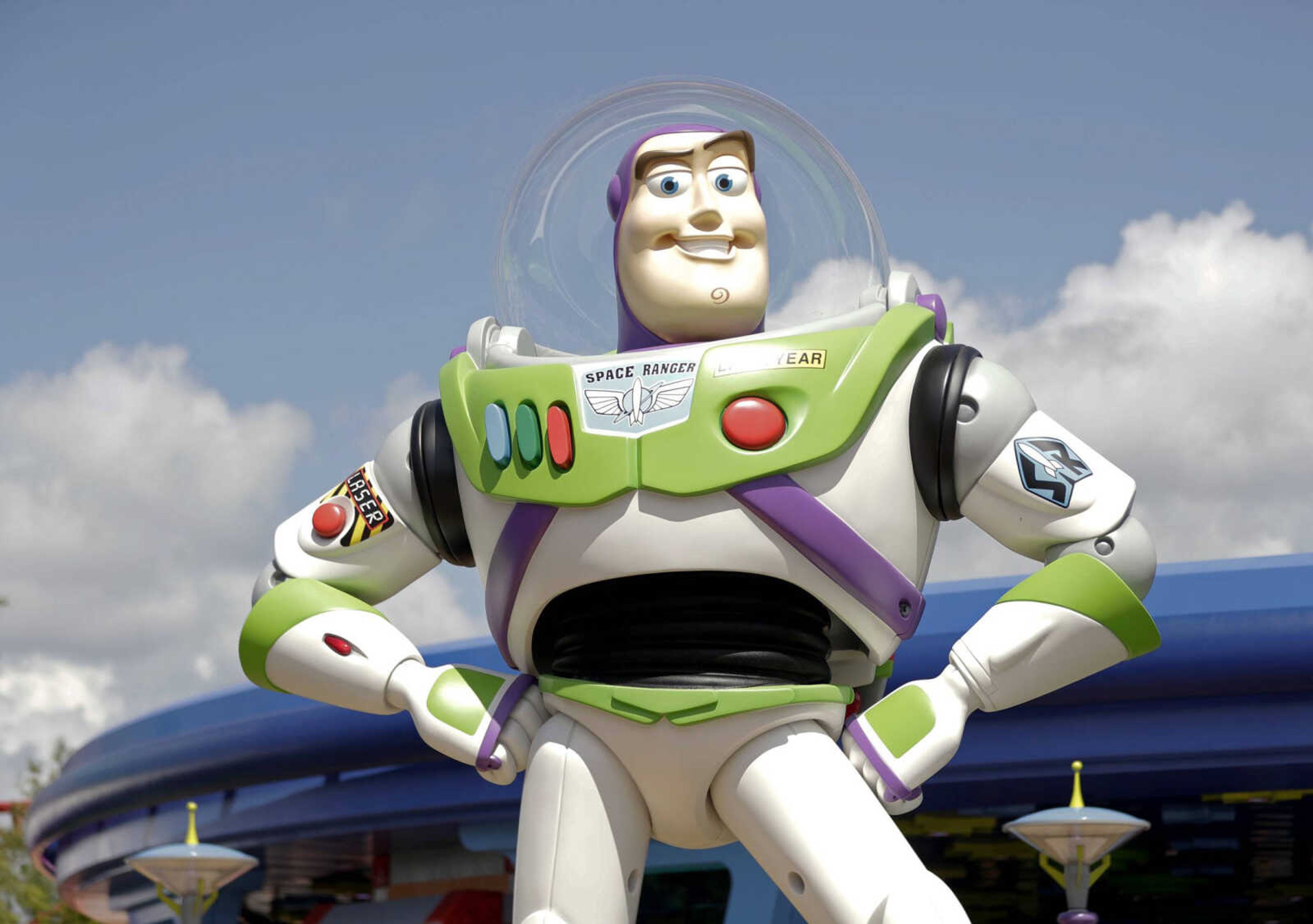 Buzz Lightyear stands near the entrance to the Aliens Swirling Saucers ride Saturday at Toy Story Land in Disney's Hollywood Studios at Walt Disney World in Lake Buena Vista, Florida.