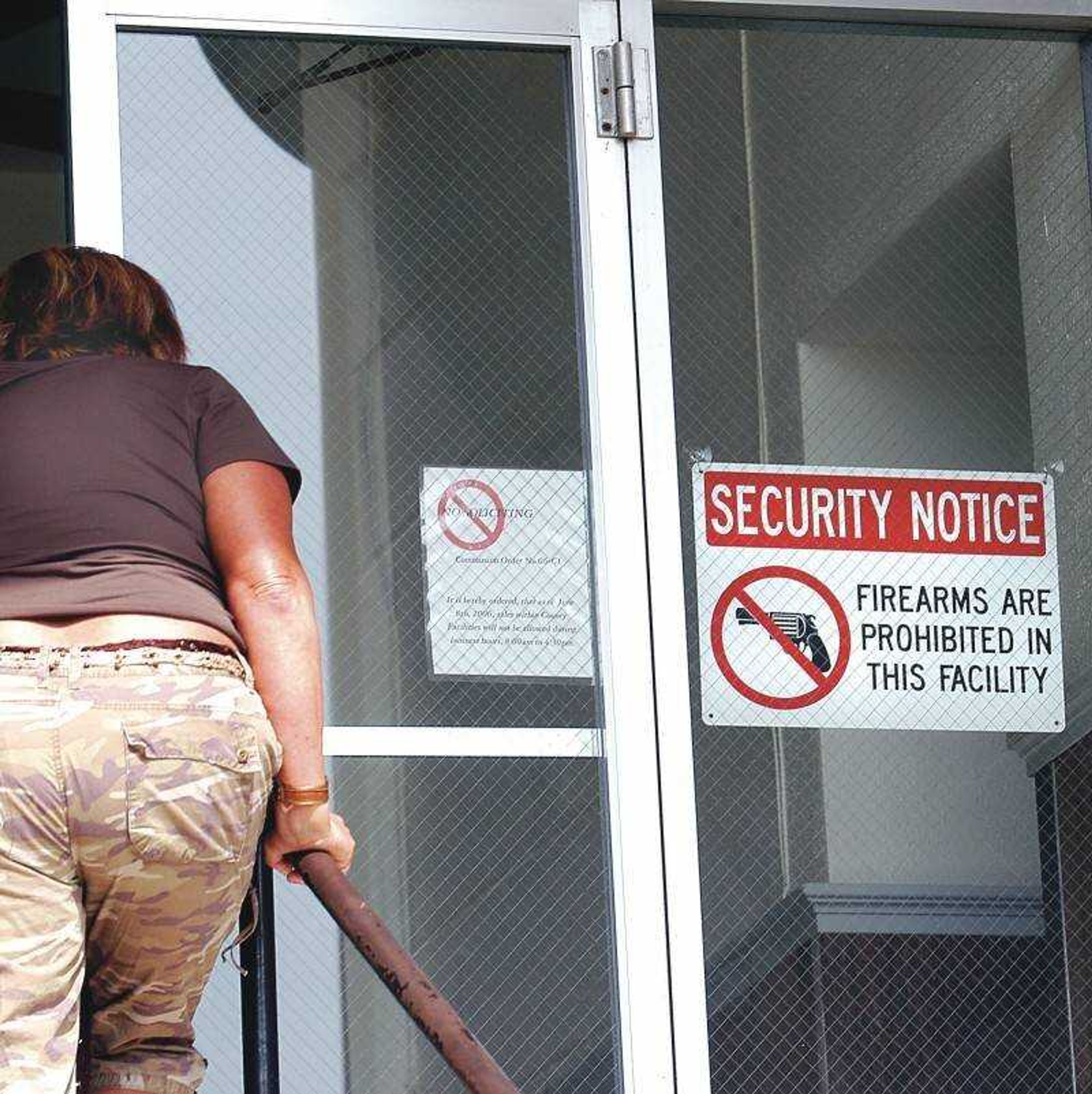 The Cape Girardeau County Court House has signs posted on the doors but doesn't have security inside to check for weapons as people enter the building. (Diane L. Wilson)