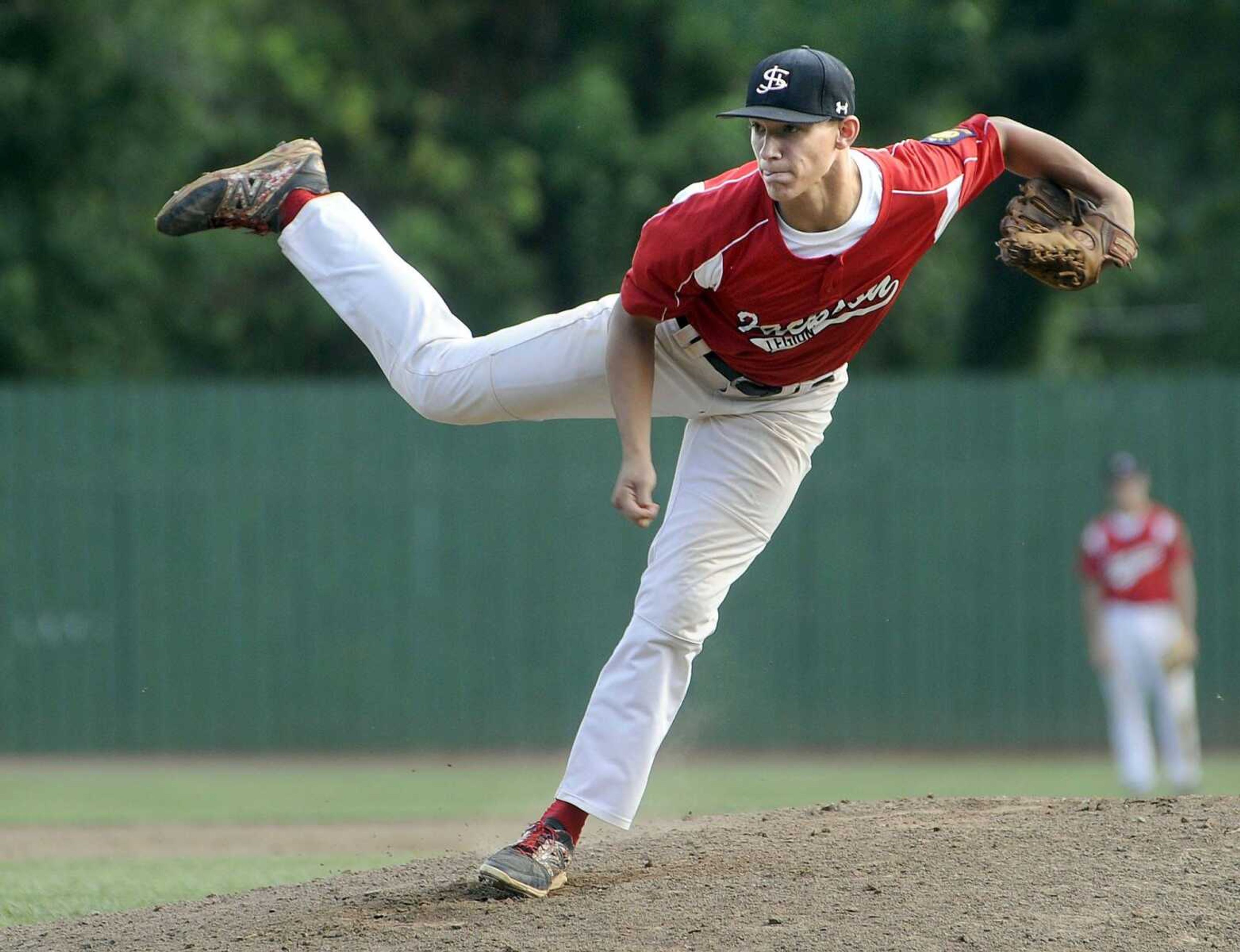 Jackson Post 158 starter Gavon Turner delivers to a Ballwin Post 611 batter during the first inning of the Zone 4 Senior American Legion tournament Thursday, July 23, 2015 in Farmington, Missouri. (Fred Lynch)