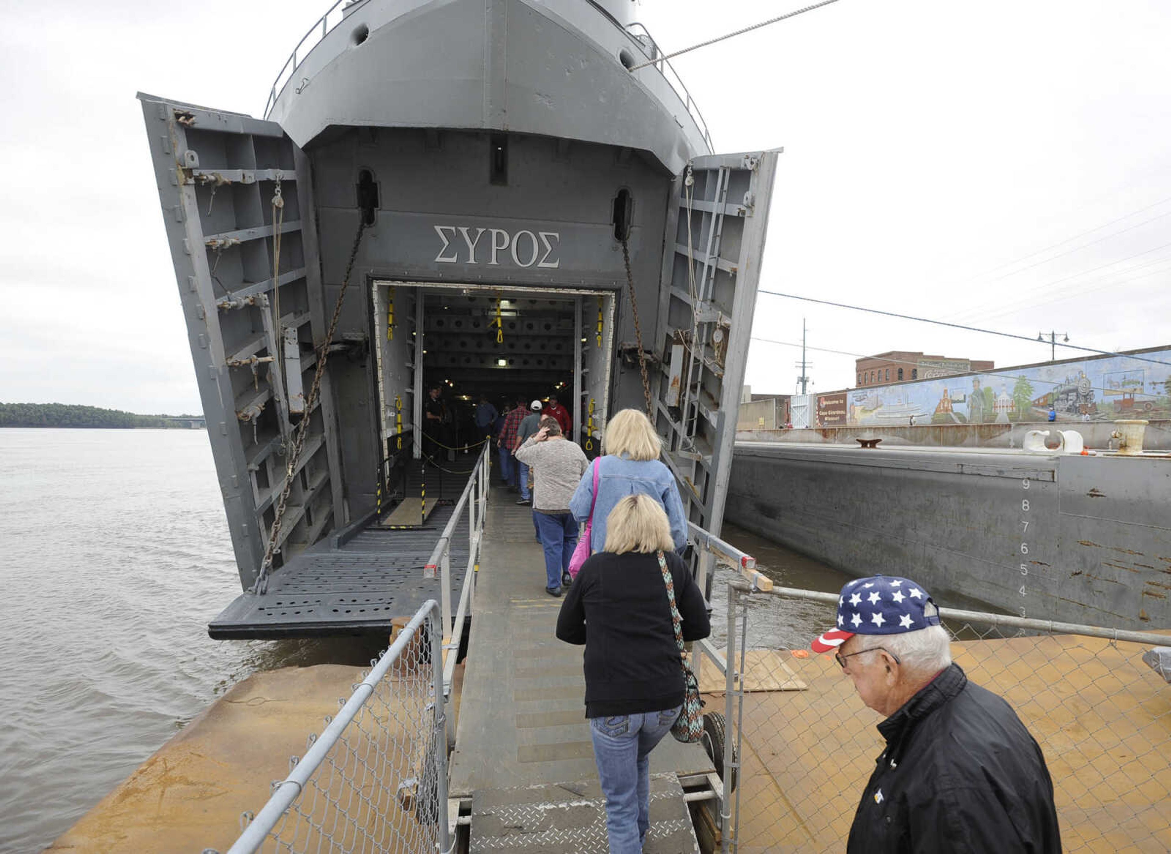 Visitors board the USS LST 325 Thursday, Sept. 29, 2016 at Riverfront Park in Cape Girardeau.