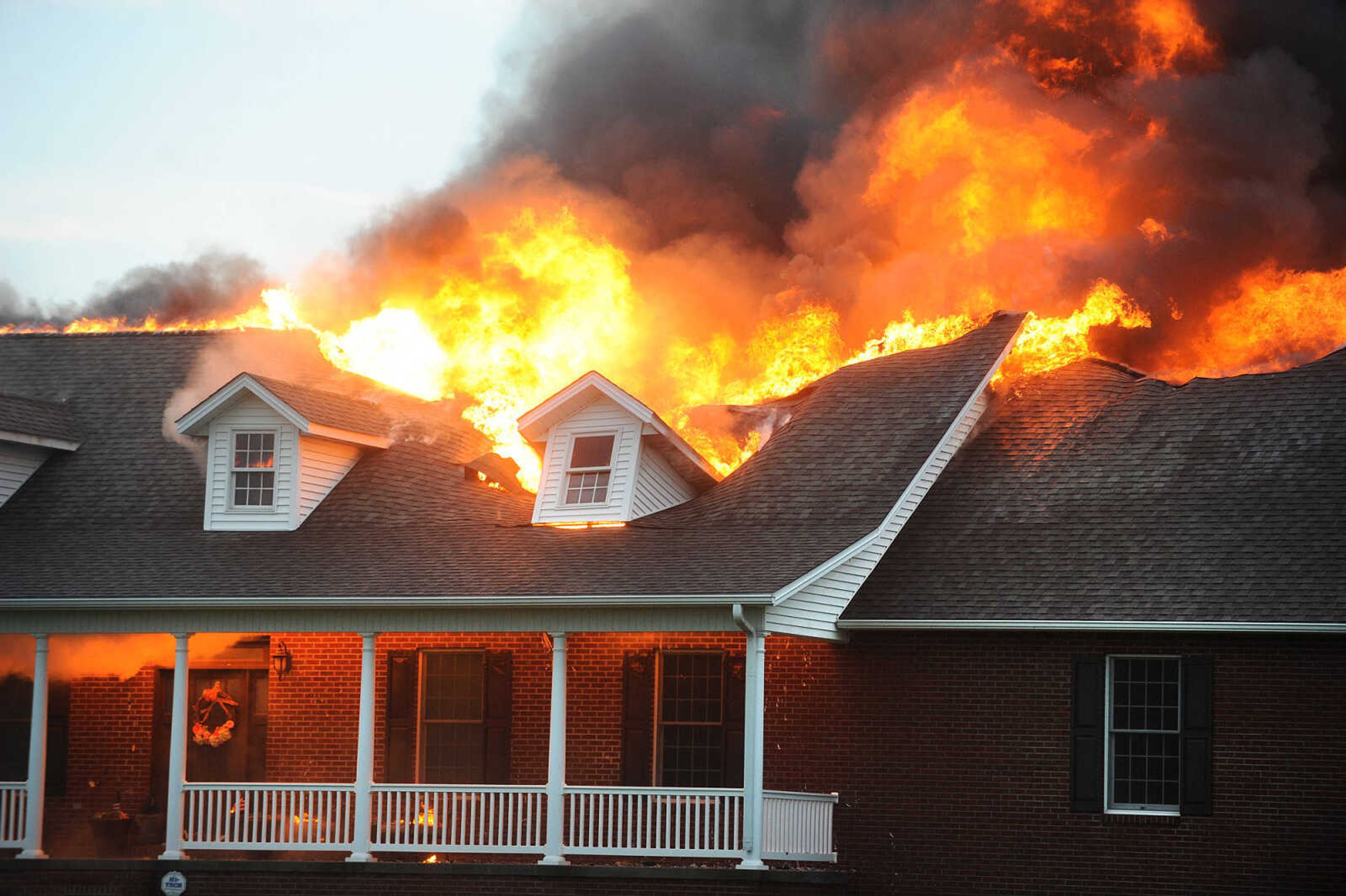 LAURA SIMON ~ lsimon@semissourian.com

Firefighters from Delta, Scott City, Chaffee and New Hamburg/Benton/Commerce battle a house fire off County Road 204 in Scott County Wednesday afternoon, July 23, 2014.